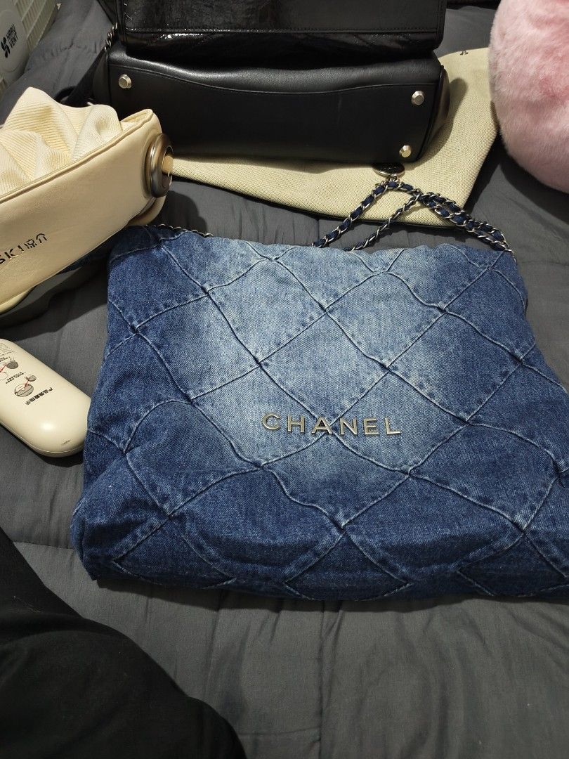 Chanel Denim Quilted Chain Bag (Category: Luxury Bags & Wallets) located in Manila. Submitted by coolstorm_111b23 (Listing ID 1420098605, Image 2). Description: - Authentic Chanel handbag - Quilted denim design - Stylish chain strap - Secure top zipper closure - Interior pocket for essentials - Iconic Chanel logo - Tote style.