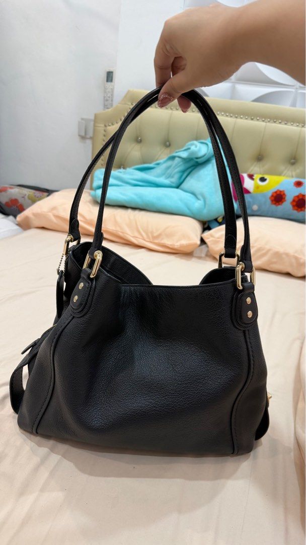 Coach edie 31 caryall shoulder bag (Category: Tote Bags) located in Digos. Submitted by rara031 (Listing ID 1420027312, Image 1). Description: 💯 Original Like new condition Yung creed lang only flaw Bought in US Pasabuy Rfs: Declutter 📍Davao del sur MOP:Gcash 🚚: JNT.