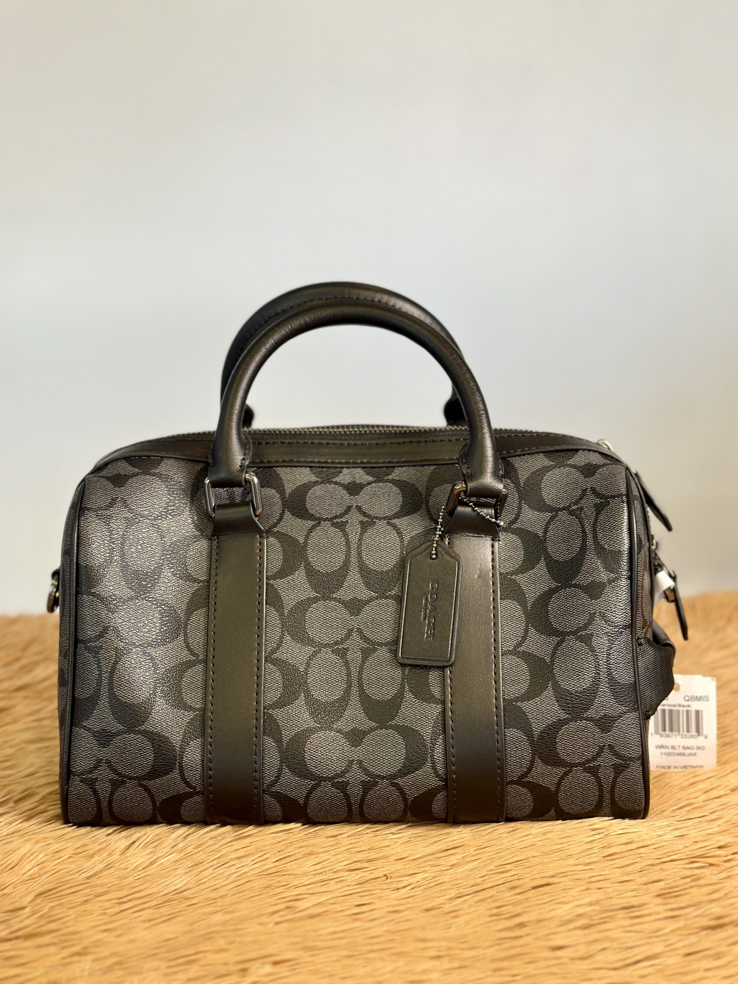 Coach Gotham Duffle 24 (Category: Luxury Bags & Wallets) located in Manila. Submitted by luxuryfinds2025 (Listing ID 1420032653, Image 1). Description: - Brand new Coach Mini Boston Bag - Classic black signature Coach pattern - Top handle and detachable shoulder strap - Secure zipper closure - Includes an interior pocket - Authentic Coach hangtag - New with tags.
