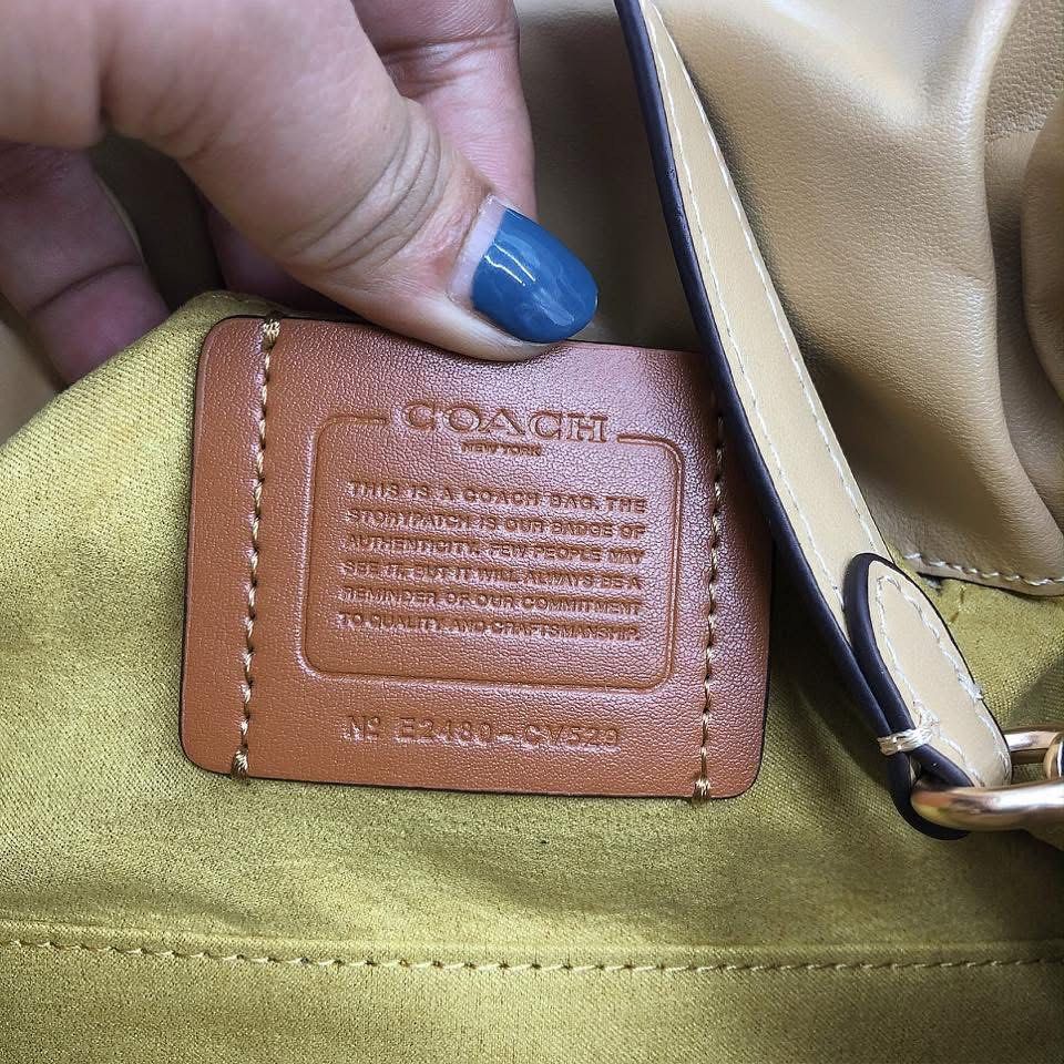Coach Pillow Tabby Shoulder Bag (Category: Luxury Bags & Wallets) located in Manila. Submitted by clairetot (Listing ID 1420093179, Image 3). Description: Coach Pillow Tabby shoulder bag. Features a soft, gathered design, top handle, and detachable shoulder strap. Includes hangtag and interior pocket. Comes with a Coach paper bag..