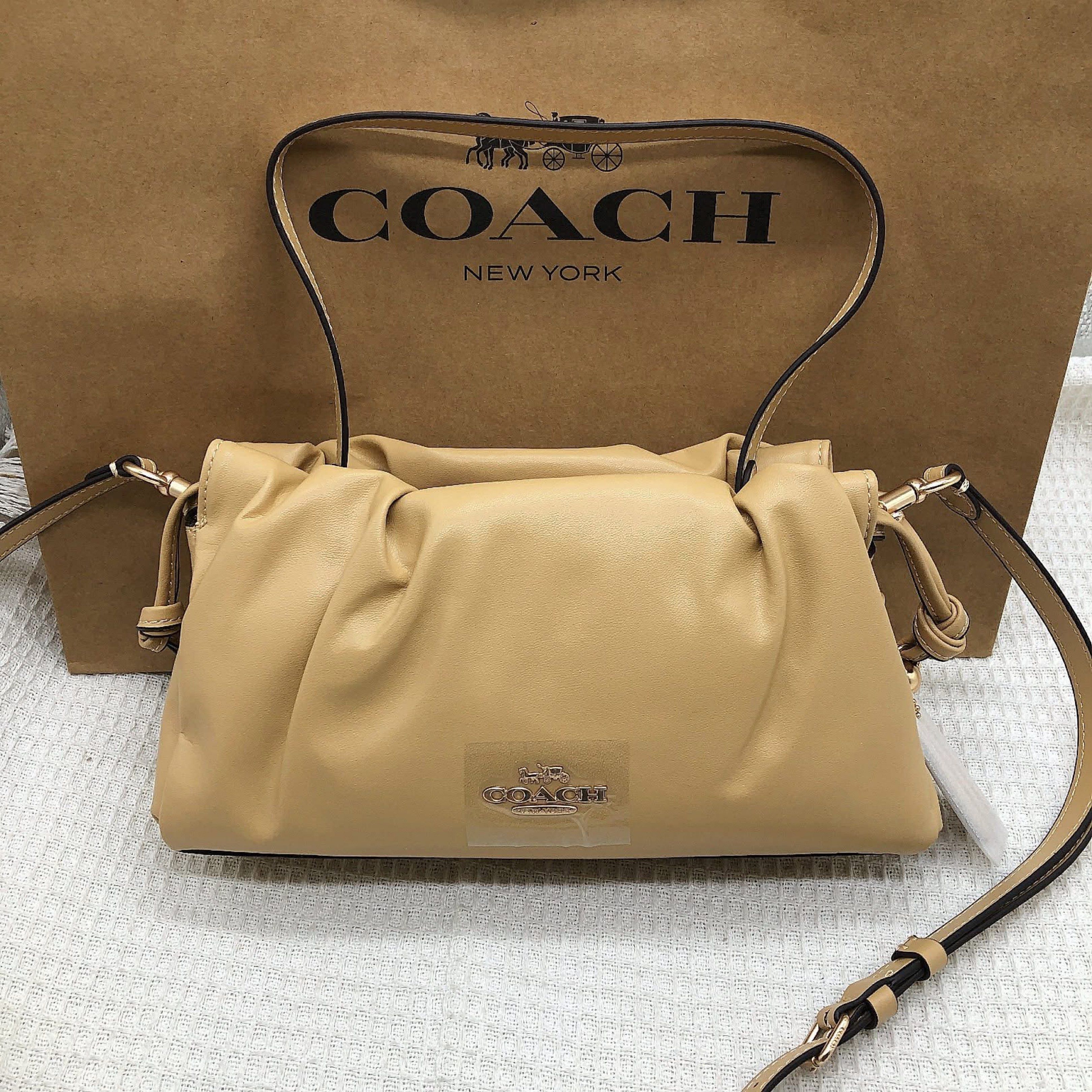 Coach Pillow Tabby Shoulder Bag (Category: Luxury Bags & Wallets) located in Manila. Submitted by clairetot (Listing ID 1420093179, Image 1). Description: Coach Pillow Tabby shoulder bag. Features a soft, gathered design, top handle, and detachable shoulder strap. Includes hangtag and interior pocket. Comes with a Coach paper bag..