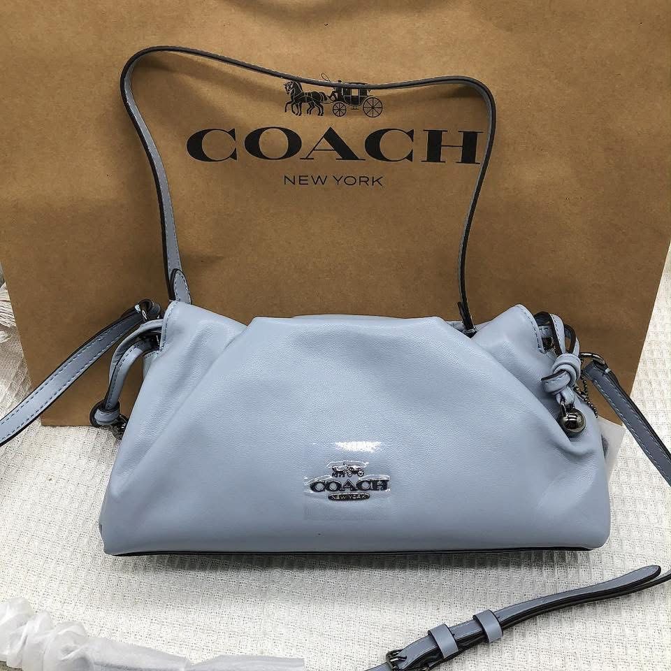 Coach Pillow Tabby Shoulder Bag (Category: Luxury Bags & Wallets) located in Manila. Submitted by clairetot (Listing ID 1420093179, Image 2). Description: Coach Pillow Tabby shoulder bag. Features a soft, gathered design, top handle, and detachable shoulder strap. Includes hangtag and interior pocket. Comes with a Coach paper bag..
