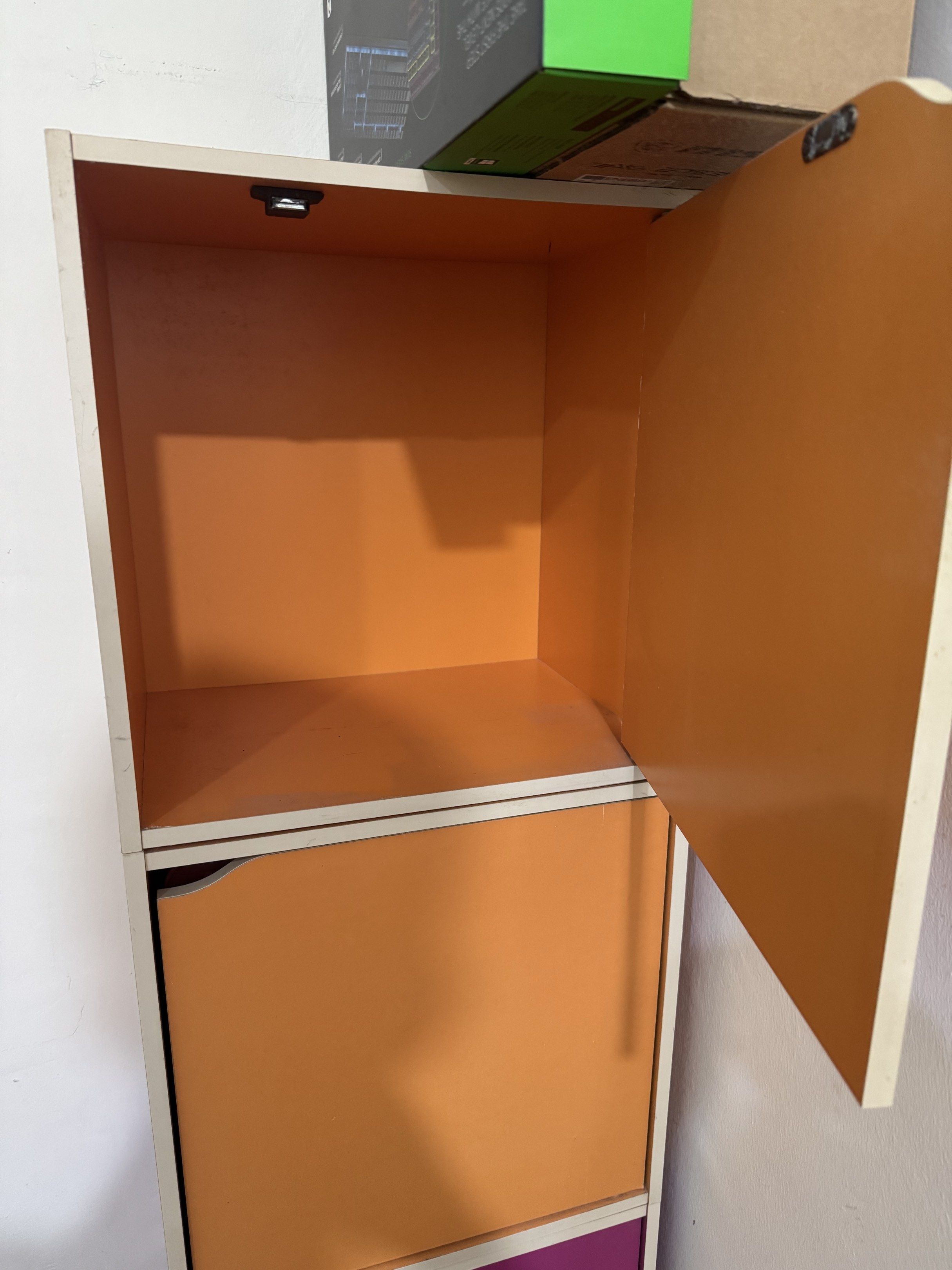 Colourful stackable storage boxes (Category: Shelves, Cabinets & Racks) located in Selayang. Submitted by hakunamatata82 (Listing ID 1420092578, Image 2). Description: - Storage cabinet - Stackable vertically with wood dowels or arrange horizontally. - Magnetic door - Dimensions for each boxes Height 40cm x Width 40cm x Depth 30cm Available colour: purple x2, orange x3, green x2 Each box RM25 Take all 7 boxes RM100 Not included shipping .