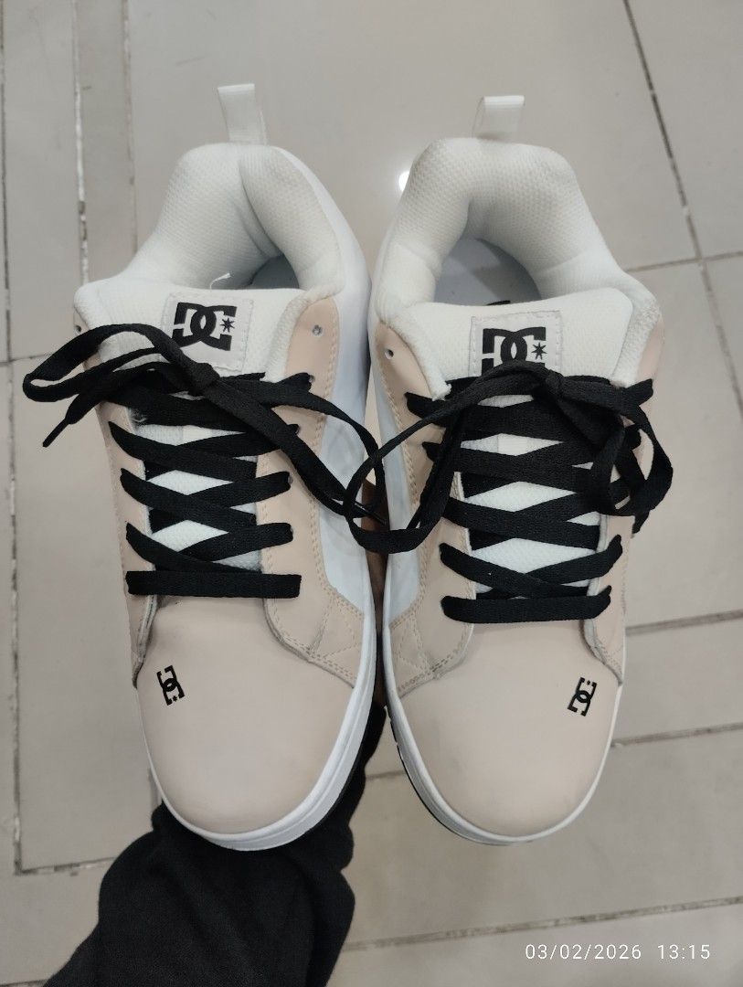 DC Shoes Men's Court Graffik (Category: Sneakers) located in Bacolod City. Submitted by hyoohxzx (Listing ID 1420115526, Image 1). Description: - DC Shoes Court Graffik - Men's shoes - Color: White and beige - Black laces - Size: US 7.5, UK 6.5, EUR 40, 25.5 cm - Sole: Black with DC Shoes logo - Material: Leather upper, rubber sole - Made in China.