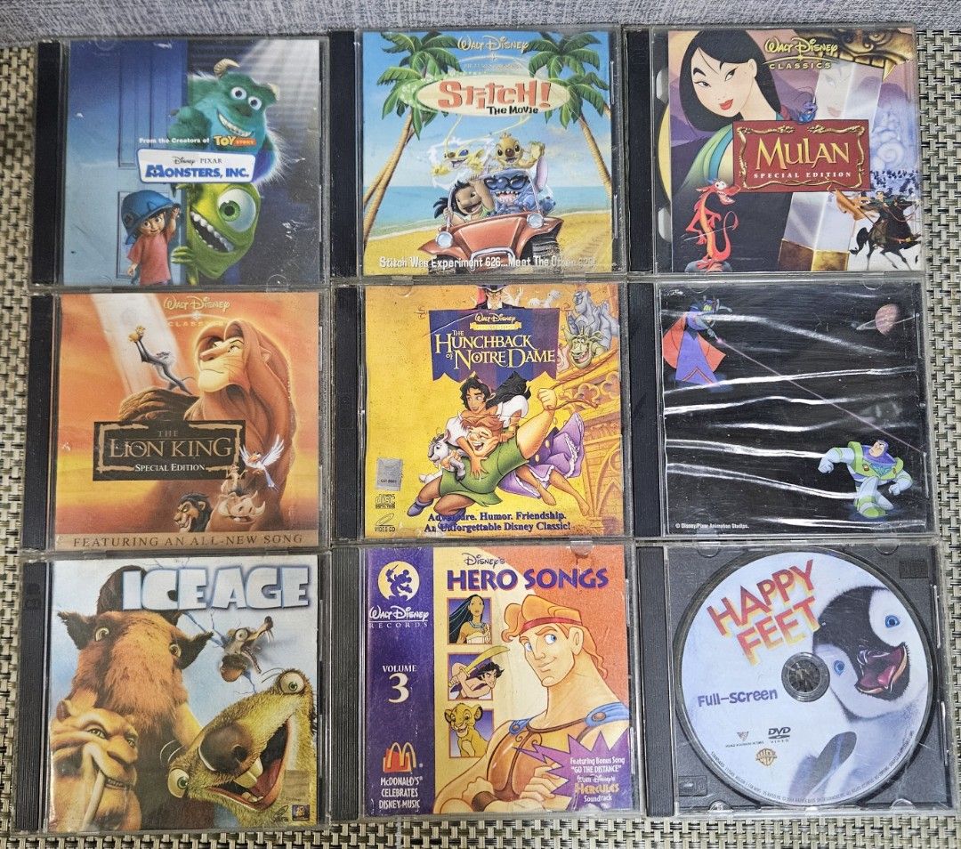 Disney DVD Collection Bundle of 9 (Category: CDs & DVDs) located in Rizal. Submitted by cherry_garcia (Listing ID 1420057388, Image 1). Description: Collection of Disney DVDs featuring popular movies. Includes "Monsters, Inc.", "Stitch! The Movie", "Mulan", "The Lion King", "The Hunchback of Notre Dame", "Buzz Lightyear", "Ice Age", "Disney Hero Songs Vol. 3", and "Happy Feet". All DVDs are in their original cases..