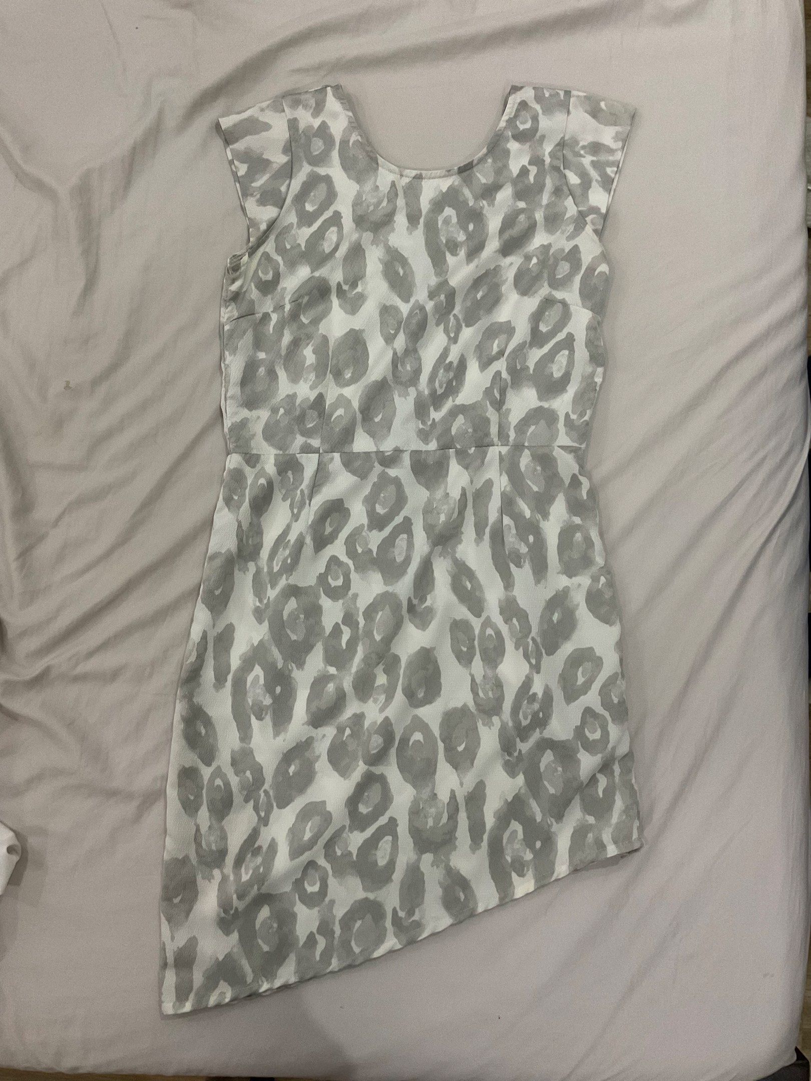 Dress for Sale (Category: Dresses) located in Las Pinas. Submitted by bea.oh (Listing ID 1420084418, Image 1). Description: Dress 1: Maldita Sleeveless white and gray leopard print. (used once) ₱100 Dress 2: Mustard yellow maxi dress with cut-out back and elastic waist. Both lightweight. (never been used) ₱300 Get both for ₱350 RFS: Not using .