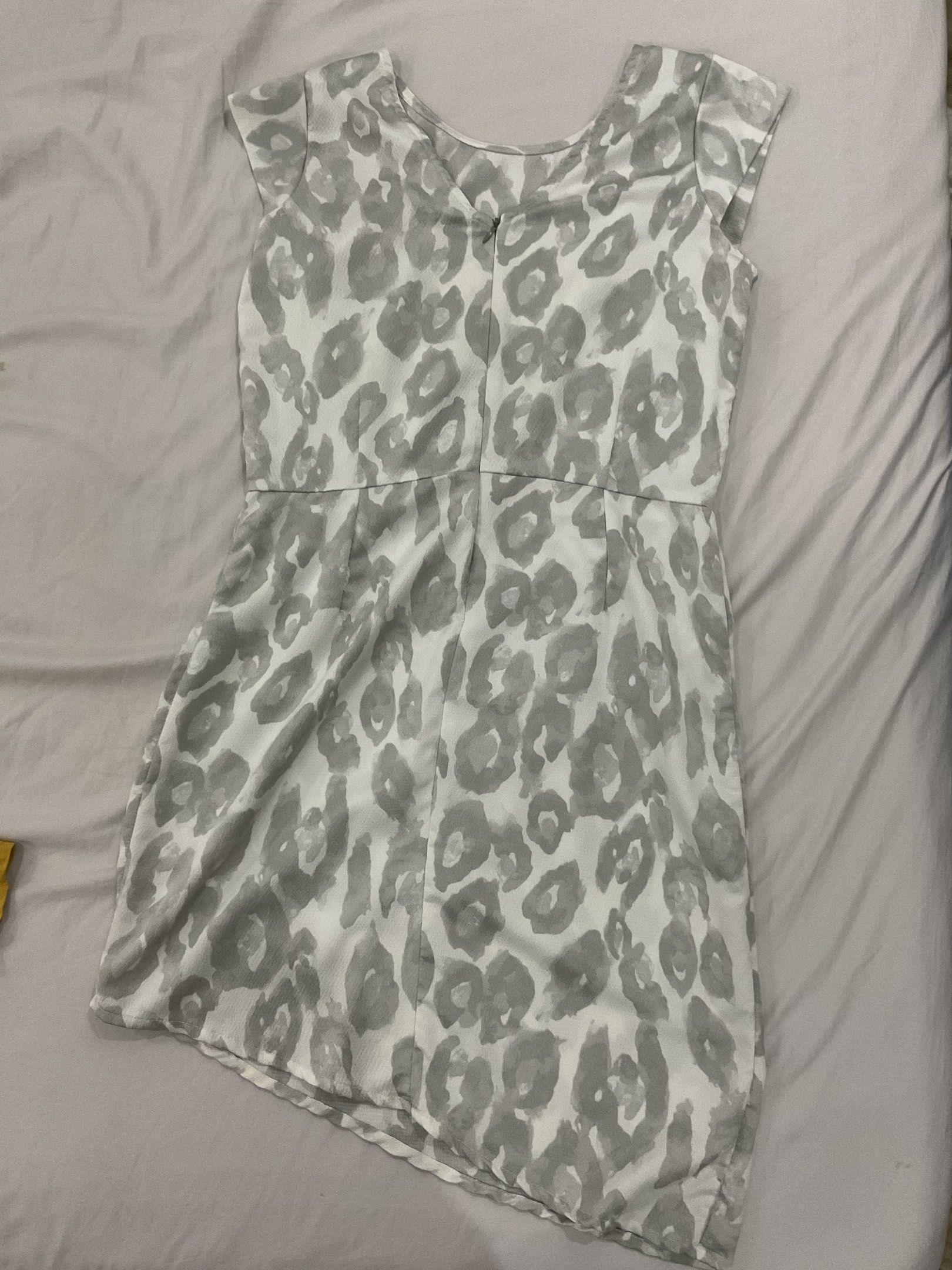 Dress for Sale (Category: Dresses) located in Las Pinas. Submitted by bea.oh (Listing ID 1420084418, Image 2). Description: Dress 1: Maldita Sleeveless white and gray leopard print. (used once) ₱100 Dress 2: Mustard yellow maxi dress with cut-out back and elastic waist. Both lightweight. (never been used) ₱300 Get both for ₱350 RFS: Not using .