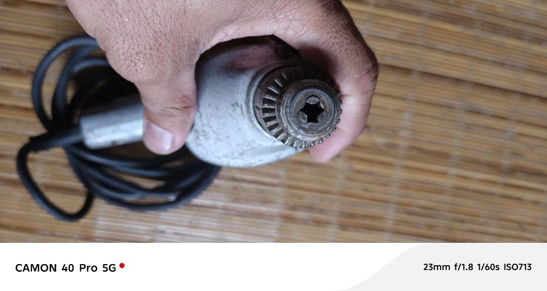 Electric Drill (Category: Construction Tools & Equipment) located in San Pedro. Submitted by tristanjapansurplus (Listing ID 1419984267, Image 3). Description: heavy duty electric drill metal casing - Working electric drill - Includes power cord - Durable metal body - Features a chuck for drill bits - Suitable for various drilling tasks.