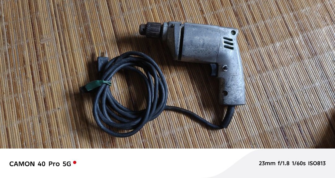 Electric Drill (Category: Construction Tools & Equipment) located in San Pedro. Submitted by tristanjapansurplus (Listing ID 1419984267, Image 1). Description: heavy duty electric drill metal casing - Working electric drill - Includes power cord - Durable metal body - Features a chuck for drill bits - Suitable for various drilling tasks.