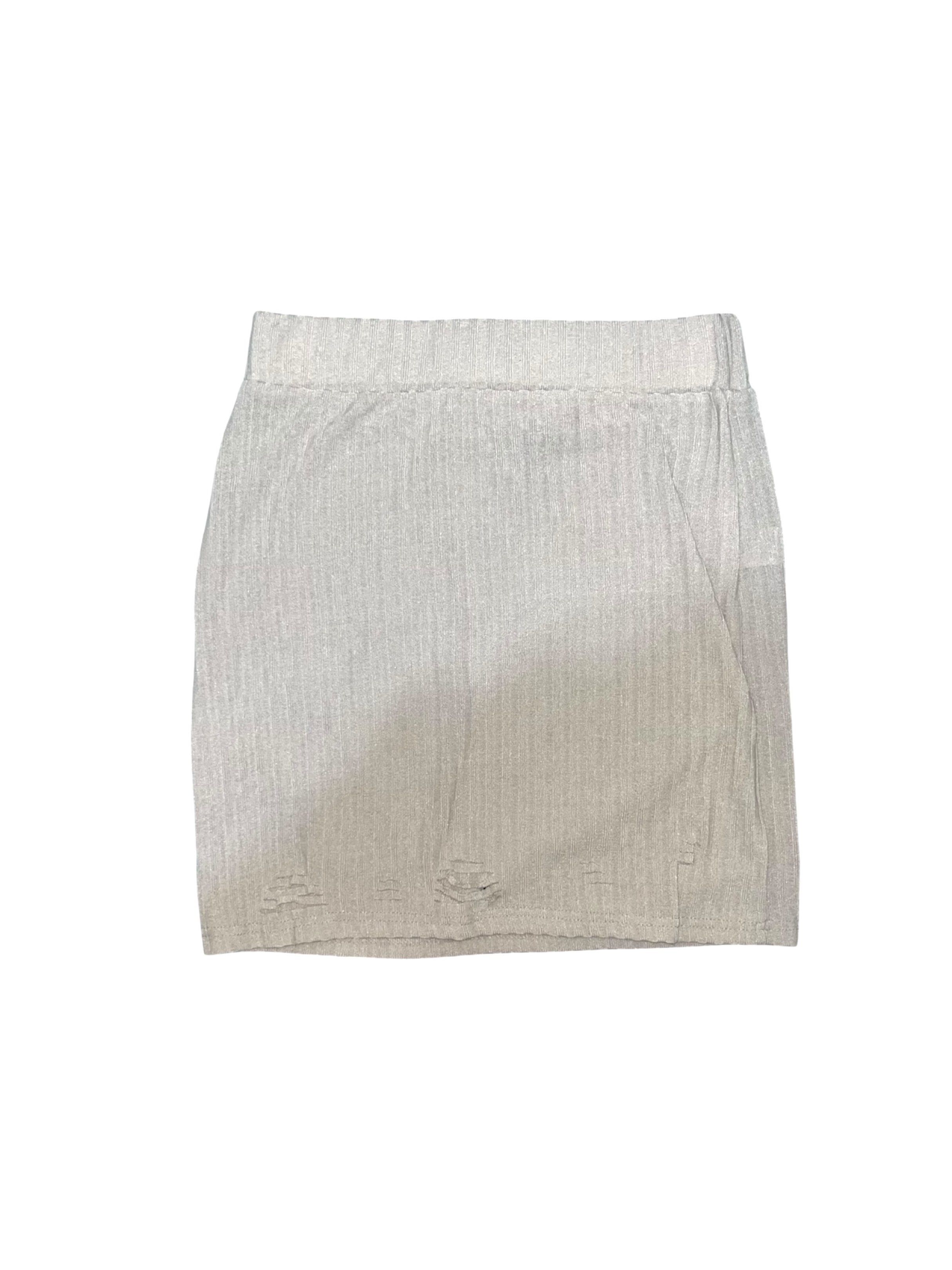 Fashion Nova Ribbed Mini Skirt (Category: Skirts) located in Agdangan. Submitted by cstlnl39 (Listing ID 1420041210, Image 1). Description: - Fashion Nova mini skirt - Size: M - Ribbed design - Neutral color - Distressed details - Knit fabric - Elastic waistband.