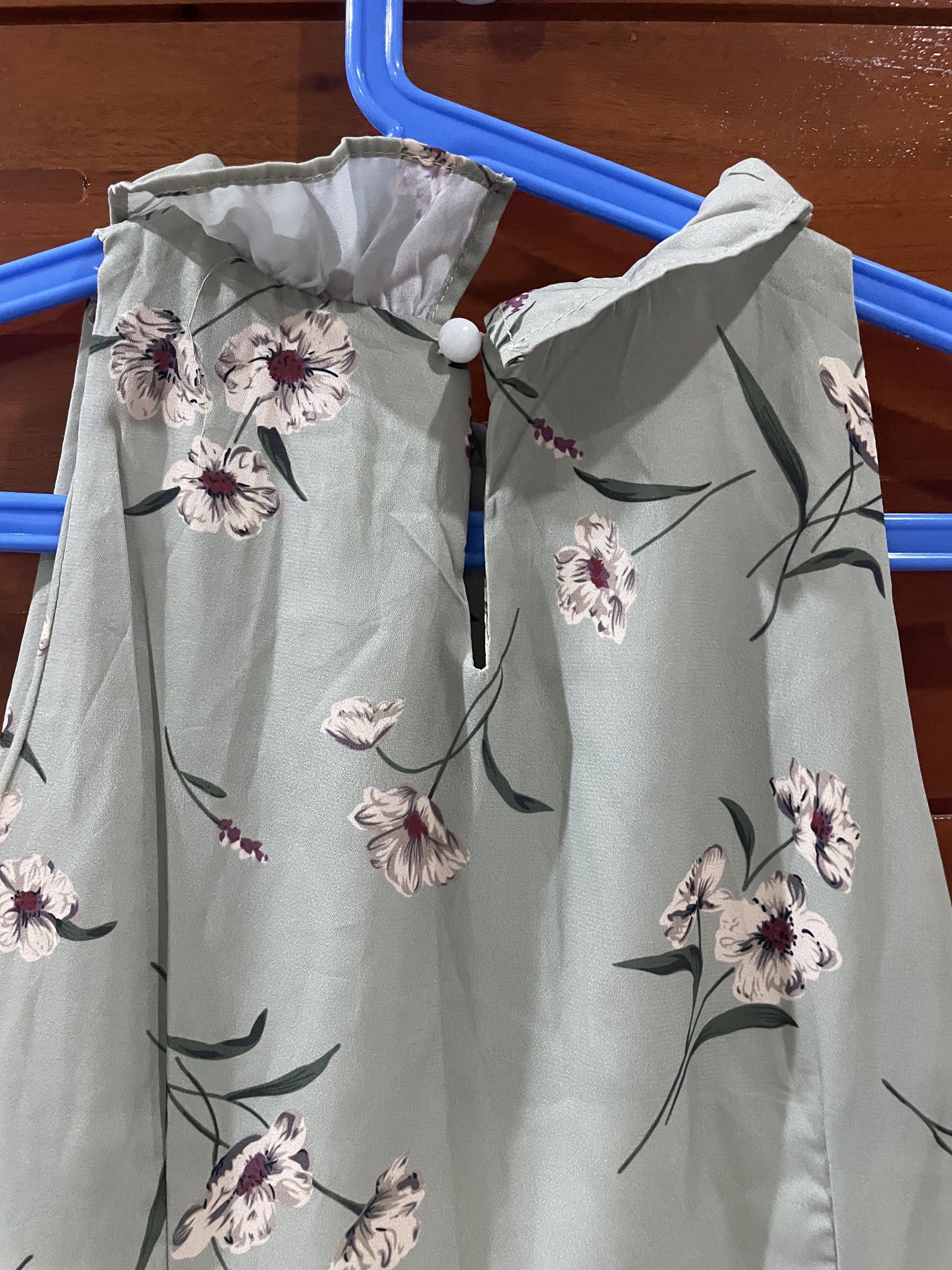 Floral Sage Green Halter Dress (Category: Dresses) located in Manila. Submitted by ms_hxppx (Listing ID 1420128044, Image 2). Description: - color is sage green (brighter in person) - Halter neckline - Side zipper closure - Flowy A-line silhouette - super cute and body hugging - accentuates curves and elegant .