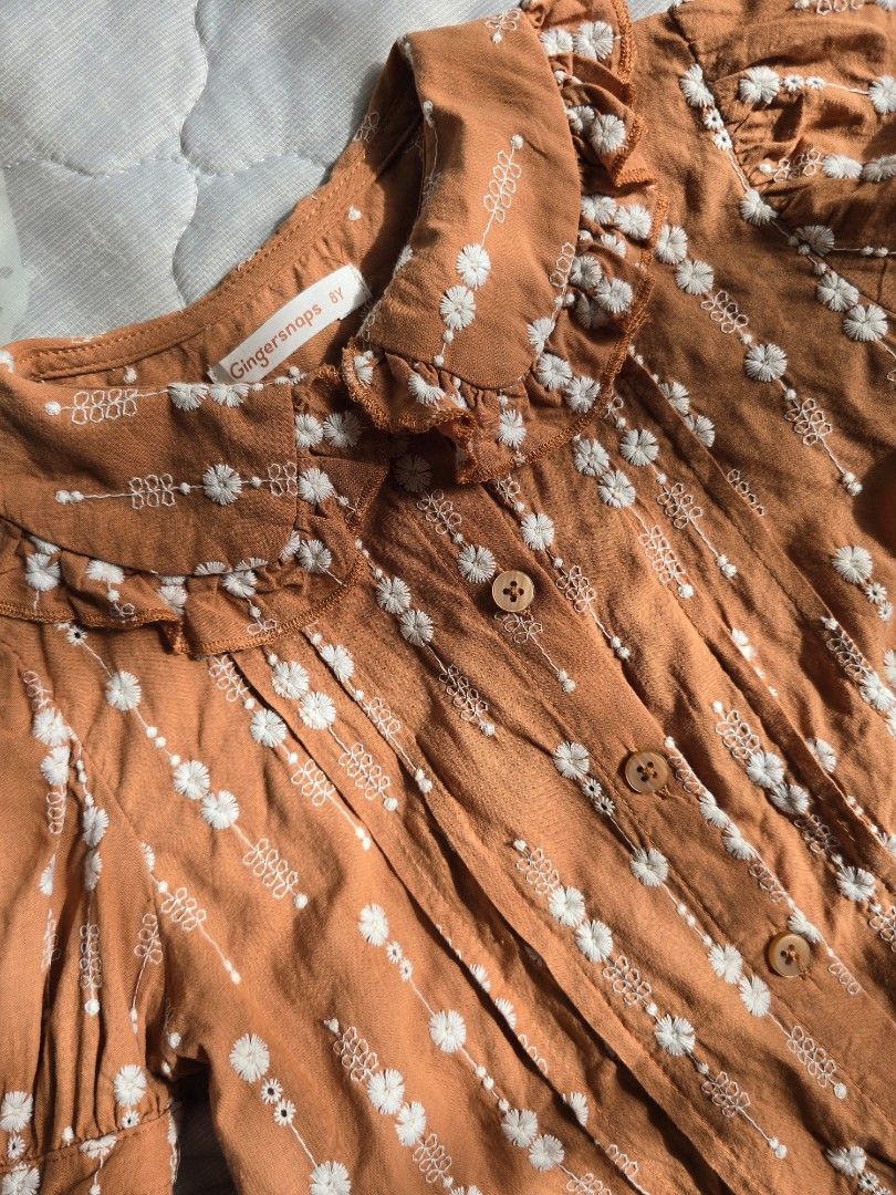 Gingersnaps Embroidered Floral Top 8Y (Category: Babies & Kids Fashion) located in Muntinlupa City. Submitted by mmmikay (Listing ID 1419986955, Image 3). Description: Gingersnaps embroidered floral top, brown 8Y. Please check measurements in last 2 pics. RFS: Outgrown Location: Muntinlupa City .