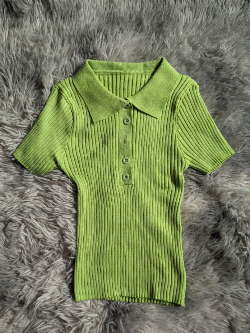 Green Ribbed Polo Top (Category: Blouses) located in Santa Rita. Submitted by elixiriaz (Listing ID 1420003248, Image 1). Description: - Stylish green ribbed polo top - Collared neckline - Short sleeves - Button-down design - Knit fabric - Versatile for various outfits.
