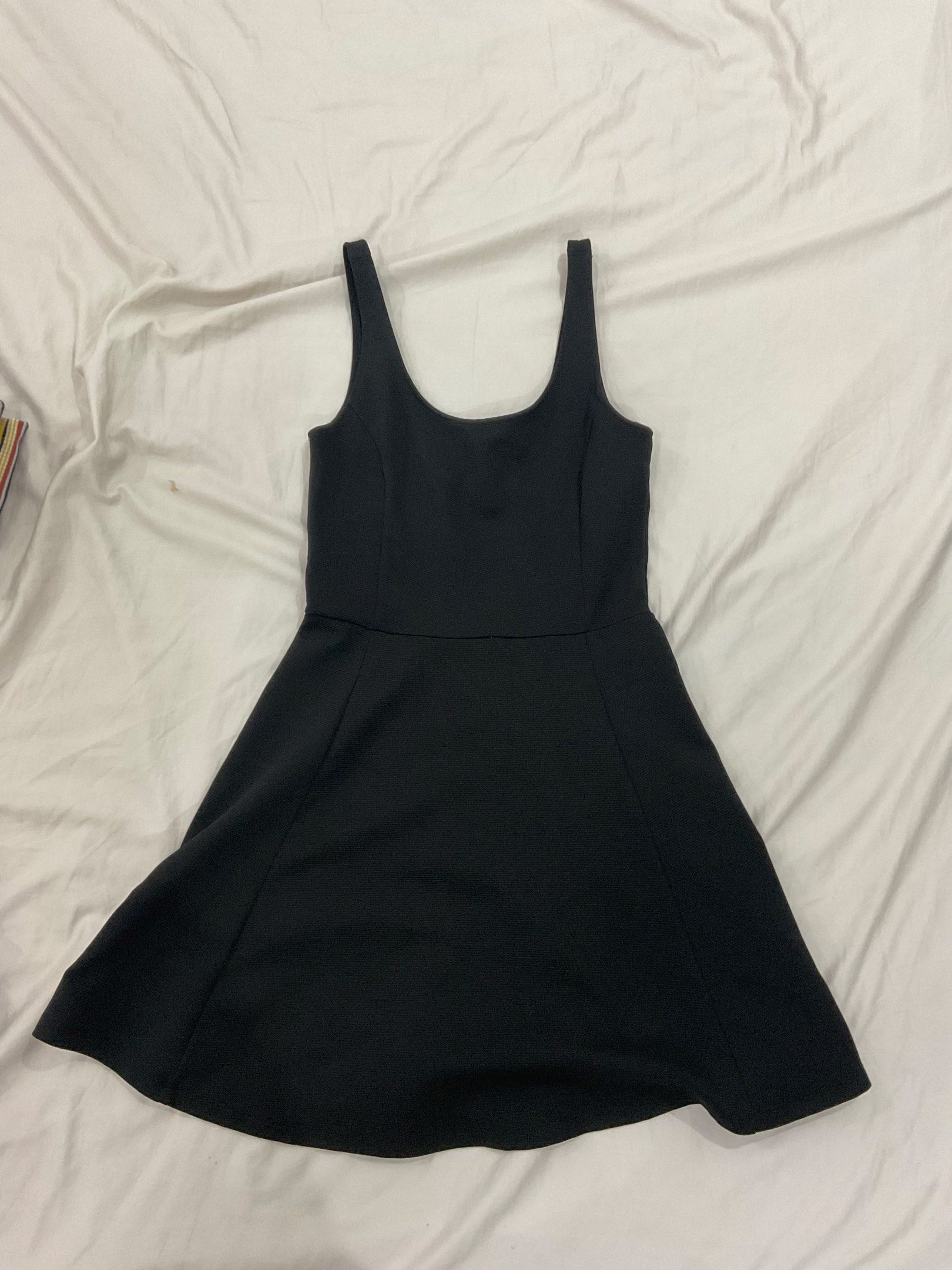 H&M Dress (Category: Dresses) located in Las Pinas. Submitted by bea.oh (Listing ID 1420083838, Image 1). Description: Dress features a sleeveless design with a scoop neckline. It has a fitted bodice that flows into a flared skirt. The dress is made of a smooth, solid black fabric. Perfect for casual events. ₱199 each sizes 36-38 RFS: Decluttering.