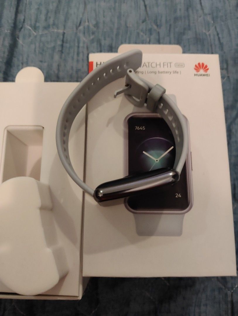 Huawei Watch Fit 2 (Category: Wearables & Smart Watches) located in Manila. Submitted by dcsago (Listing ID 1419986264, Image 2). Description: - Huawei Watch Fit 2 - 1.74" AMOLED display - Light gray strap - Rectangular design - Ready to pair (QR code shown) - In original box.