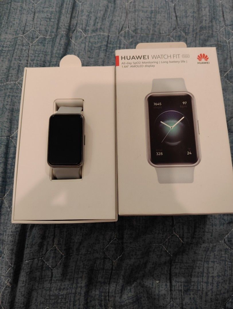 Huawei Watch Fit 2 (Category: Wearables & Smart Watches) located in Manila. Submitted by dcsago (Listing ID 1419986264, Image 1). Description: - Huawei Watch Fit 2 - 1.74" AMOLED display - Light gray strap - Rectangular design - Ready to pair (QR code shown) - In original box.