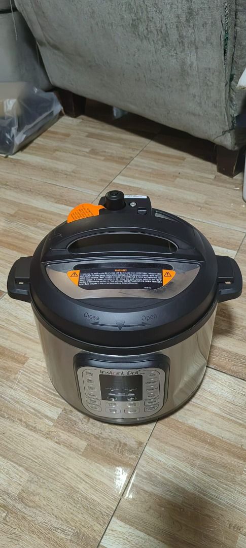 Instant Pot Duo 60 Electric Pressure Cooker (Category: Cookers) located in Rizal. Submitted by joan5505 (Listing ID 1420086865, Image 2). Description: Instant Pot Duo 60 electric pressure cooker. It has multiple cooking functions including soup broth, meat stew, bean chili, poultry, slow cook, saute, rice, multigrain, porridge, steam, yogurt, and pressure cook. The capacity is 5.7L. Includes the inner pot, steam rack, power cord, and user manual.