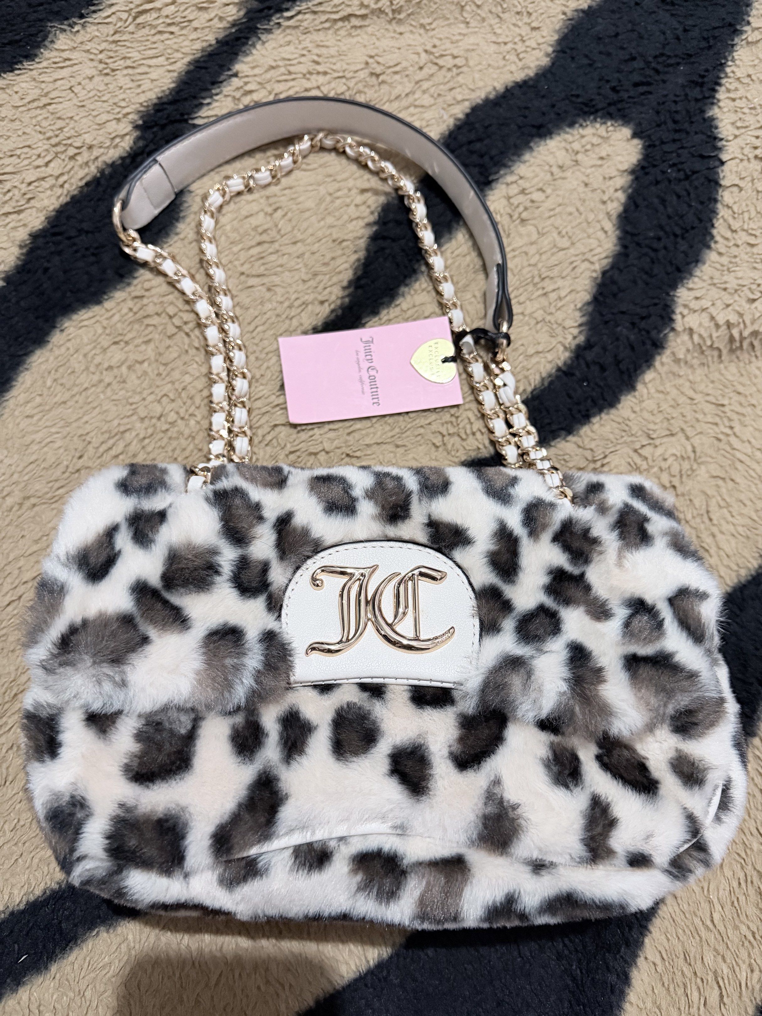 Juicy Couture Snow Leopard Shoulder Bag (Category: Shoulder Bags) located in Manila. Submitted by trinity_86 (Listing ID 1420099216, Image 1). Description: Authentic brand new with tags Gcash/bank transfer J&T/Lalamove.