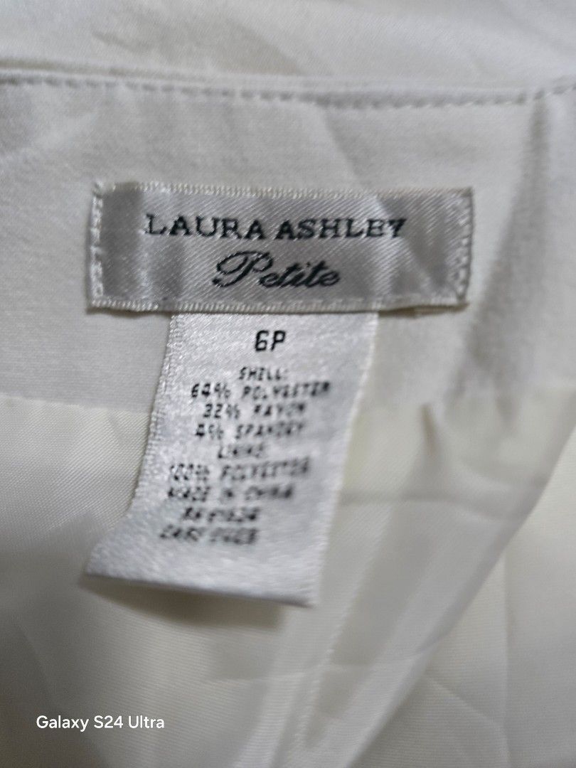 Laura Ashley Petite White Skirt (Category: Skirts) located in Cavite. Submitted by beatanealu44683 (Listing ID 1420134907, Image 2). Description: - Laura Ashley Petite skirt - Size: 6P - Style: Midi skirt - Condition: Good - Shell: 64% polyester, 32% rayon, 4% spandex - Lining: 100% polyester -with double lining 27-29 waist.