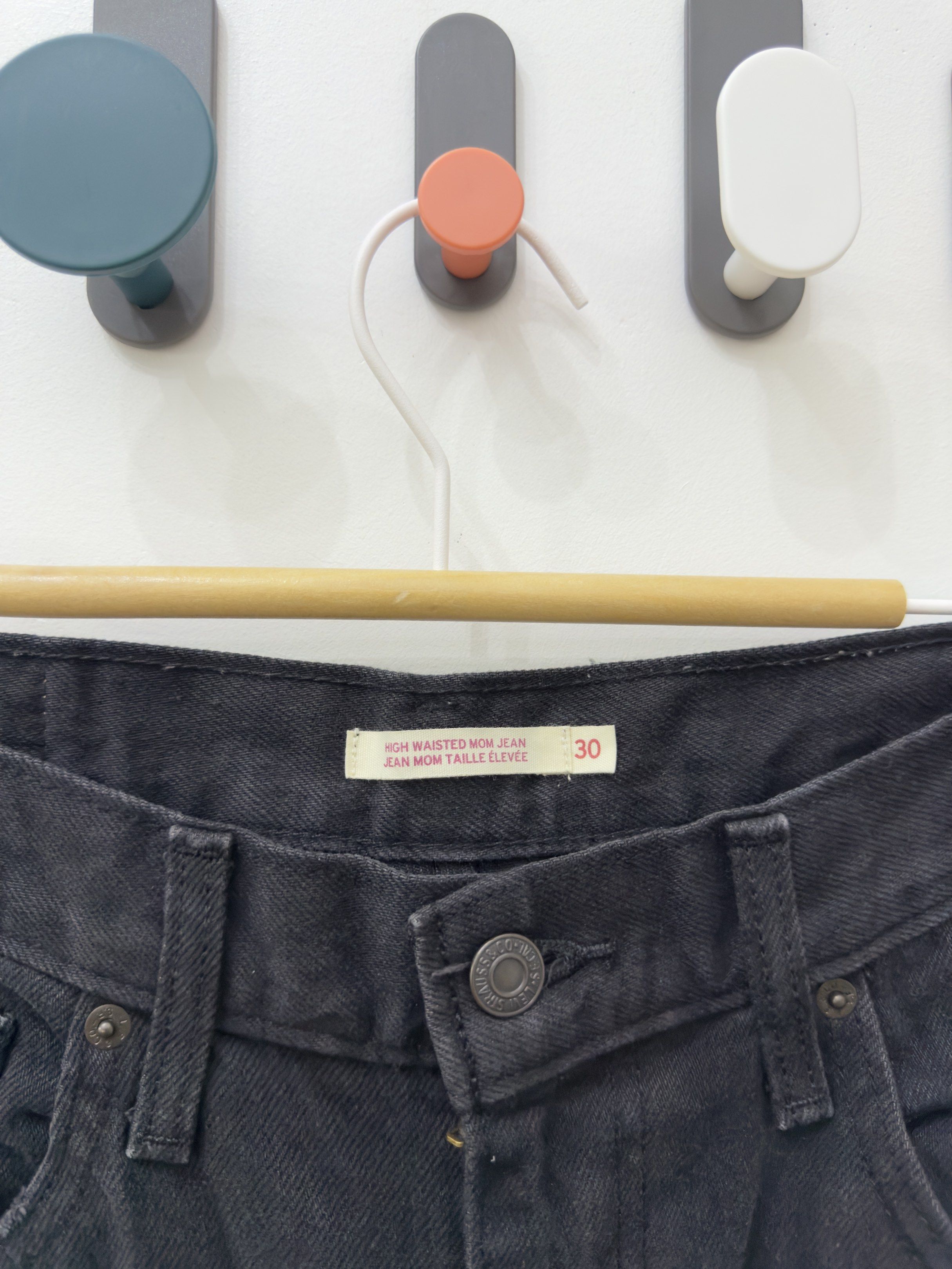 Levi's High Waisted Mom Jeans - Size 30 (Category: Jeans) located in Mandaluyong City. Submitted by riaaaaaam (Listing ID 1420089780, Image 3). Description: - Levi's Mom Jeans - High-waisted - Size 30-31 - Distressed knee detailing - Classic five-pocket design - Button and zipper closure - Levi's logo patch.