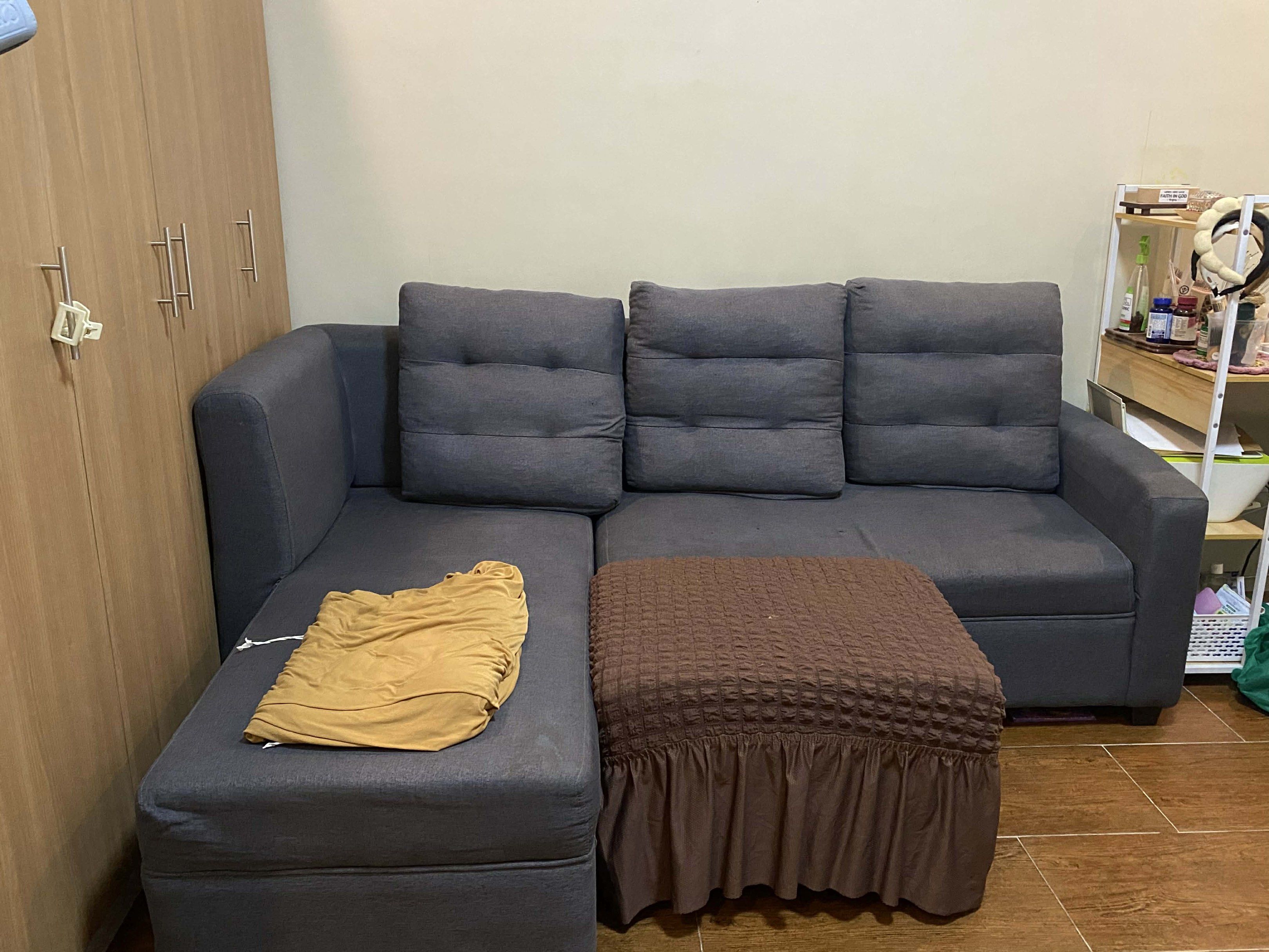 L-Shaped Sofa (Category: Sofas) located in Quezon City. Submitted by etc.bestsellershoppe (Listing ID 1420140211, Image 1). Description: - L-shaped sofa - Dark gray fabric - Sofa has three back cushions and a chaise lounge - Ideal for living rooms and apartments - with free cover.