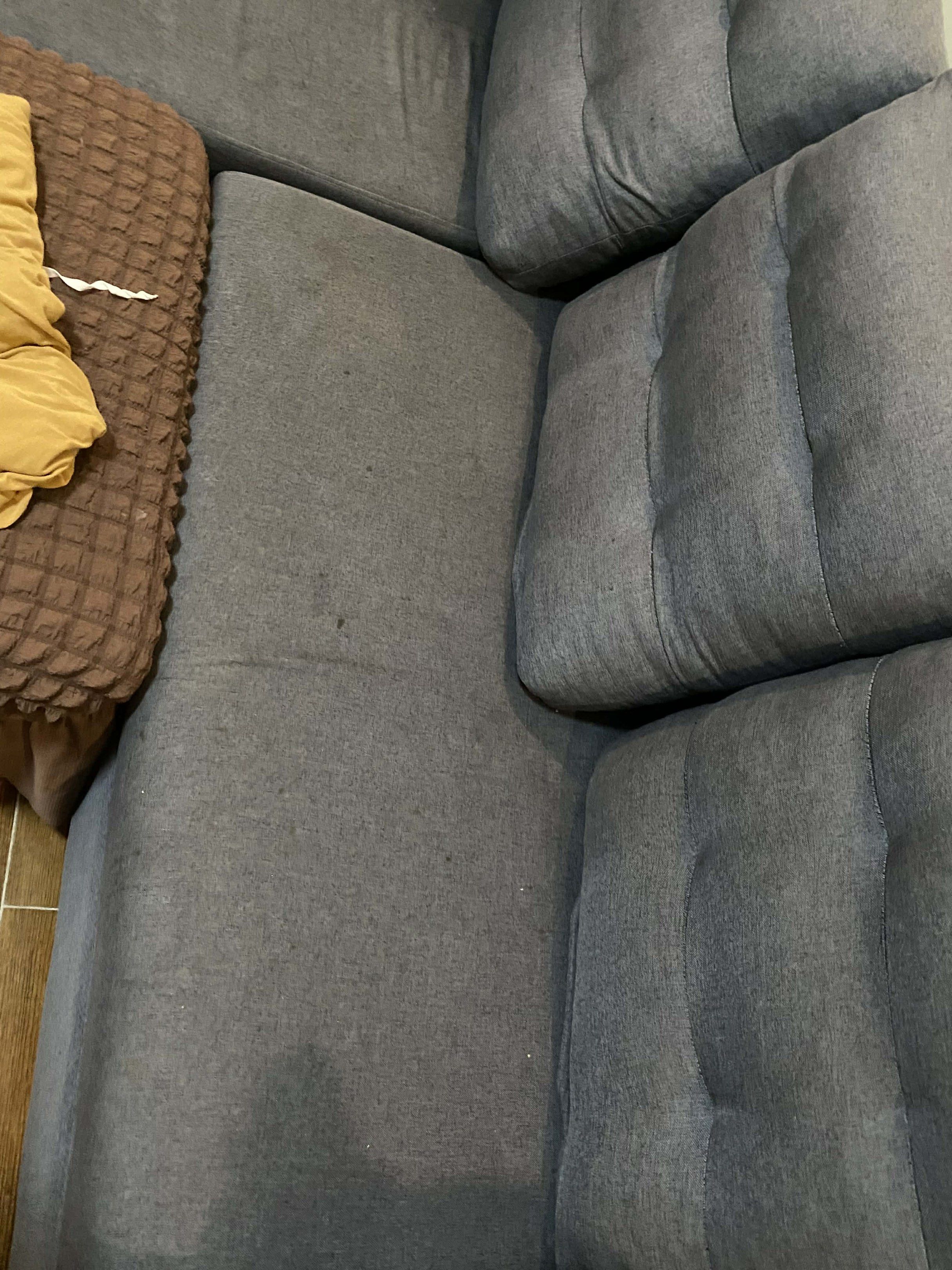 L-Shaped Sofa (Category: Sofas) located in Quezon City. Submitted by etc.bestsellershoppe (Listing ID 1420140211, Image 2). Description: - L-shaped sofa - Dark gray fabric - Sofa has three back cushions and a chaise lounge - Ideal for living rooms and apartments - with free cover.