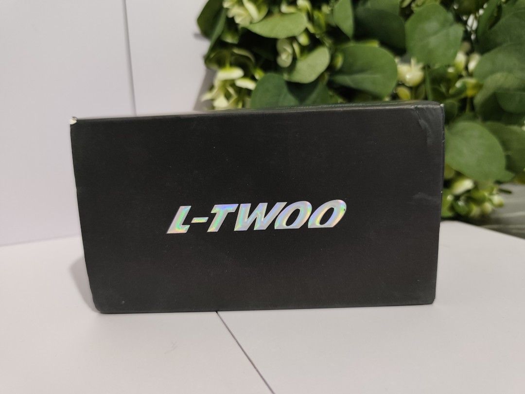 L-TWOO A5 1x9 Speed Shifter (Category: Bicycles) located in Baguio. Submitted by thriftndrift_2025 (Listing ID 1420021926, Image 2). Description: - L-TWOO A5 1x9 speed shifter - Includes shifter and cable - Comes in original box - Features L-TWOO logo - Box includes holographic sticker - Box includes manufacturer's address and contact information - Recycling symbols on box.