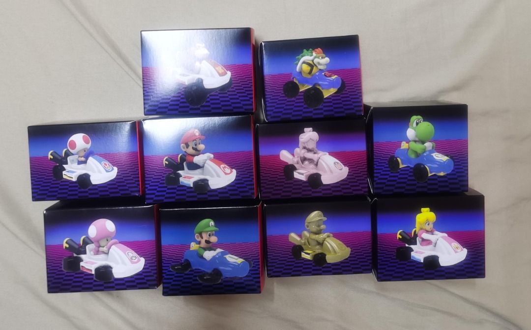 Various McDonalds Happy Meal Toys (Category: Character Goods) located in Manila. Submitted by tabitabz (Listing ID 1419994094, Image 2). Description: For Sale as set only Mario Kart Happy Meal, already applied stickers to all the toys except for the GOLD mario and SILVER peach (Unopened). Spiderman Brand New Day backpack launcher - P 100.00/pc or 250/set of 4 Spiderman figures SET of 4- BIB, no modifications made, used for display only - P 1,200.