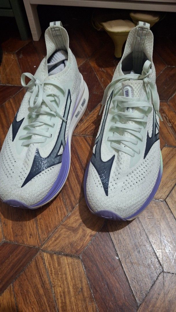 Mizuno Neo Zen Running Shoes (Category: Sneakers) located in Las Pinas. Submitted by mgr29 (Listing ID 1419981965, Image 1). Description: Size 24.5cm ran a few kms with it. very comfy. no flaws on knit no heel drags excellent condition just neesds cleaning. - Mizuno Neo Zen running shoes - Light green and purple colorway - Features Mizuno logo - Gradient sole design - 'Mizuno Running' insole.