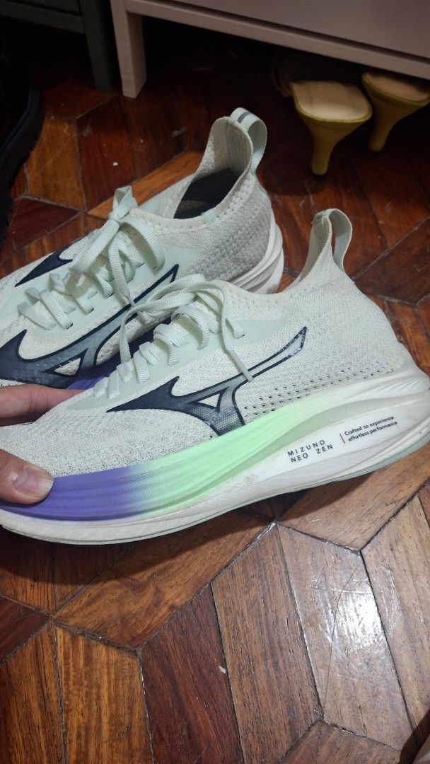Mizuno Neo Zen Running Shoes (Category: Sneakers) located in Las Pinas. Submitted by mgr29 (Listing ID 1419981965, Image 3). Description: Size 24.5cm ran a few kms with it. very comfy. no flaws on knit no heel drags excellent condition just neesds cleaning. - Mizuno Neo Zen running shoes - Light green and purple colorway - Features Mizuno logo - Gradient sole design - 'Mizuno Running' insole.