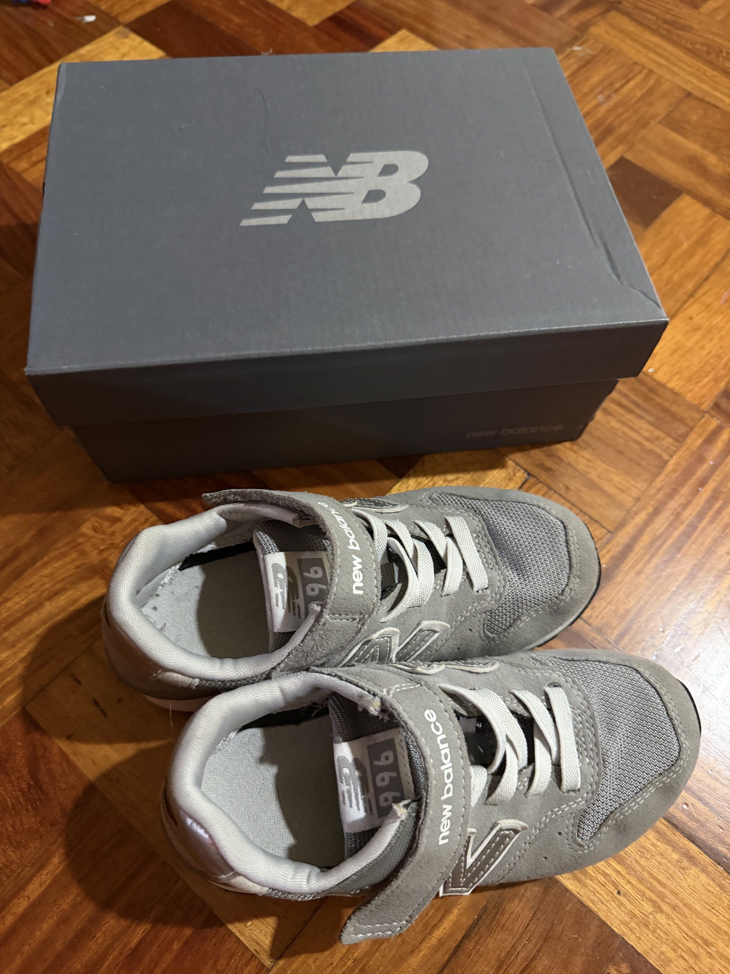 New Balance 996 Kids Shoes size JPN19 (Category: Babies & Kids Fashion) located in Quezon City. Submitted by dianiza (Listing ID 1419979110, Image 1). Description: - New Balance 996 kids shoes - Color: Gray - Easy hook-and-loop closure - Features the New Balance logo - Includes original box - Perfect for everyday wear.