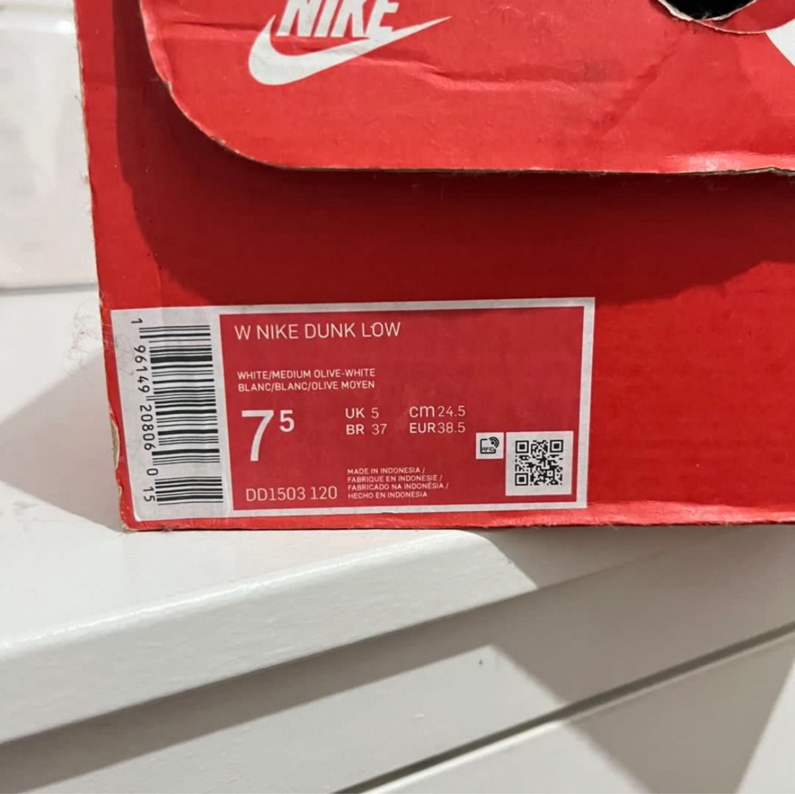 Nike Dunk Low White Medium Olive (Category: Sneakers) located in Cebu City. Submitted by namliao (Listing ID 1420134488, Image 3). Description: - Nike Dunk Low - Colorway: White/Medium Olive - Size: US 7.5 - Includes original box - Features: - White leather on toe box and side panels - Olive green leather overlays - White Nike swoosh - Olive green laces.