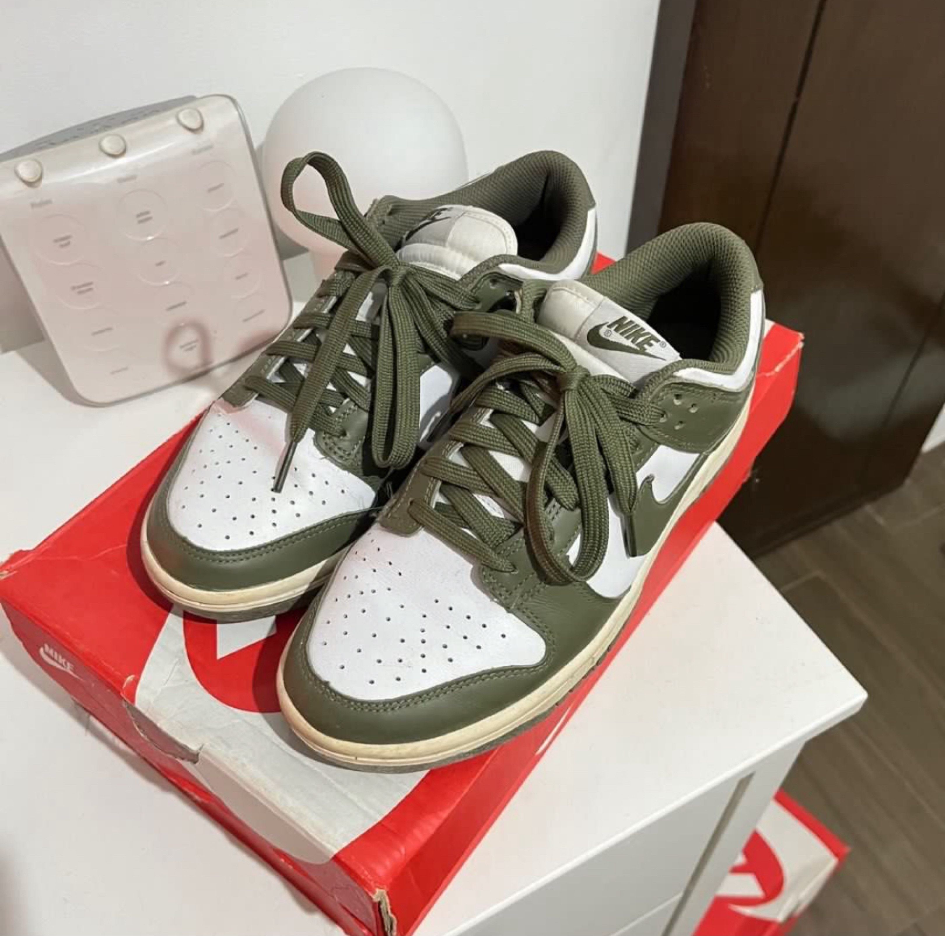 Nike Dunk Low White Medium Olive (Category: Sneakers) located in Cebu City. Submitted by namliao (Listing ID 1420134488, Image 2). Description: - Nike Dunk Low - Colorway: White/Medium Olive - Size: US 7.5 - Includes original box - Features: - White leather on toe box and side panels - Olive green leather overlays - White Nike swoosh - Olive green laces.