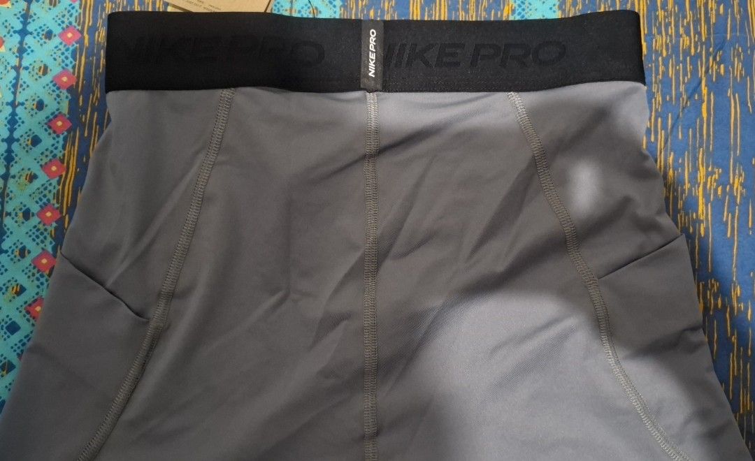 Nike Pro Compression Shorts (Category: Activewear) located in Manila. Submitted by jp.bautista (Listing ID 1420095821, Image 3). Description: - Nike Pro compression shorts - Gray color - Size Small - Black waistband with Nike Pro logo - Brand new with original tags - Made with polyester and spandex - Designed for athletic activities - Snug fit for support and comfort te t: 09336195757.