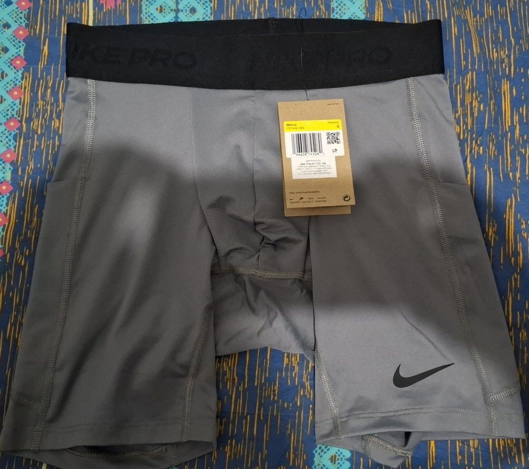 Nike Pro Compression Shorts (Category: Activewear) located in Manila. Submitted by jp.bautista (Listing ID 1420095821, Image 1). Description: - Nike Pro compression shorts - Gray color - Size Small - Black waistband with Nike Pro logo - Brand new with original tags - Made with polyester and spandex - Designed for athletic activities - Snug fit for support and comfort te t: 09336195757.