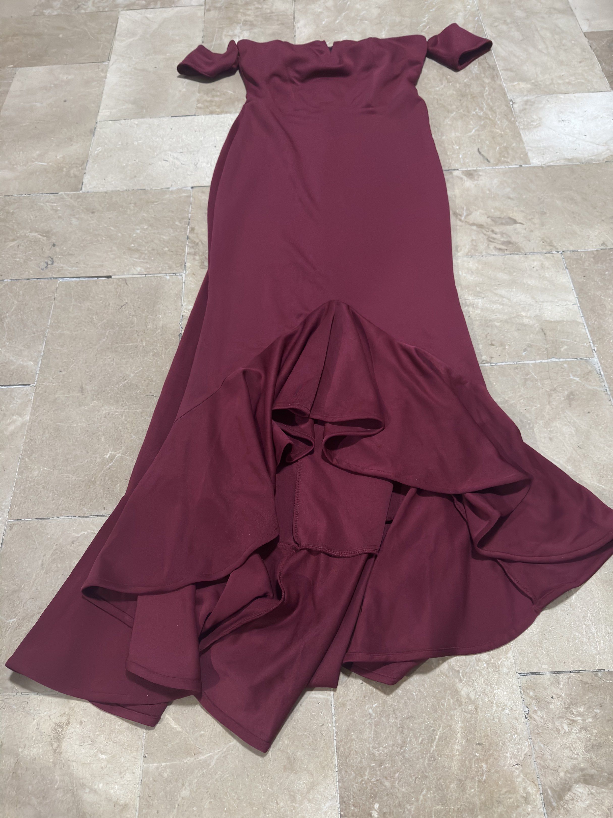 Off-Shoulder Long Mermaid Evening Dress (Category: Dresses) located in Marikina City. Submitted by chiigrmz (Listing ID 1420111437, Image 3). Description: SIZE M on tag fits M-L -Elegant off-shoulder design - Stunning burgundy color - Flattering mermaid silhouette - Fitted bodice - Flowing mermaid hem - Perfect for formal occasions.