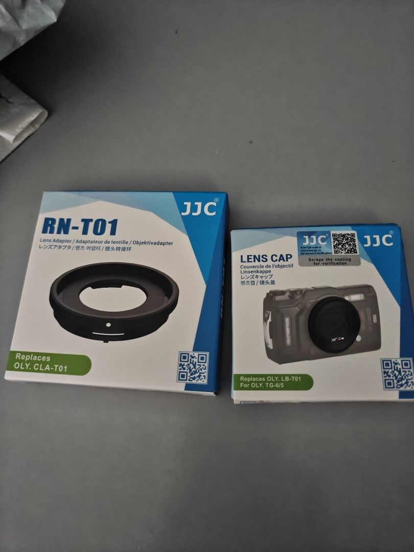 Olympus TG Lens Adapter and Lens Cap (Category: Lens & Kits) located in Tarlac. Submitted by raphocehcap (Listing ID 1420059909, Image 1). Description: - JJC RN-T01 lens adapter (replaces OLY CLA-T21) - Lens cap (replaces OLY LB-T01 for OLY TG-6/5) - Both items in original boxes - Protects your camera lens - Expands camera capabilities.