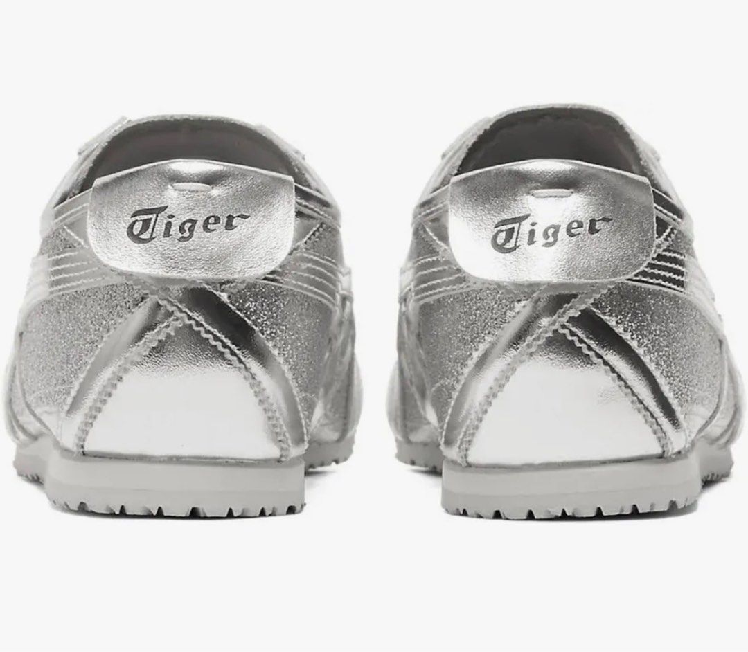 [Limited Edition only available in Japan] Onitsuka Tiger Mexico 66 Silver Glitter Sneakers (Category: Sneakers) located in Singapore. Submitted by loom78 (Listing ID 1420077282, Image 3). Description: - Brand new Onitsuka Tiger Mexico 66 - Silver glitter color - Includes original box and extra laces - Never worn and only limited edition in Japan - Perfect for adding a touch of sparkle to your outfit! - meet up only at Hillview or Beauty World mrt