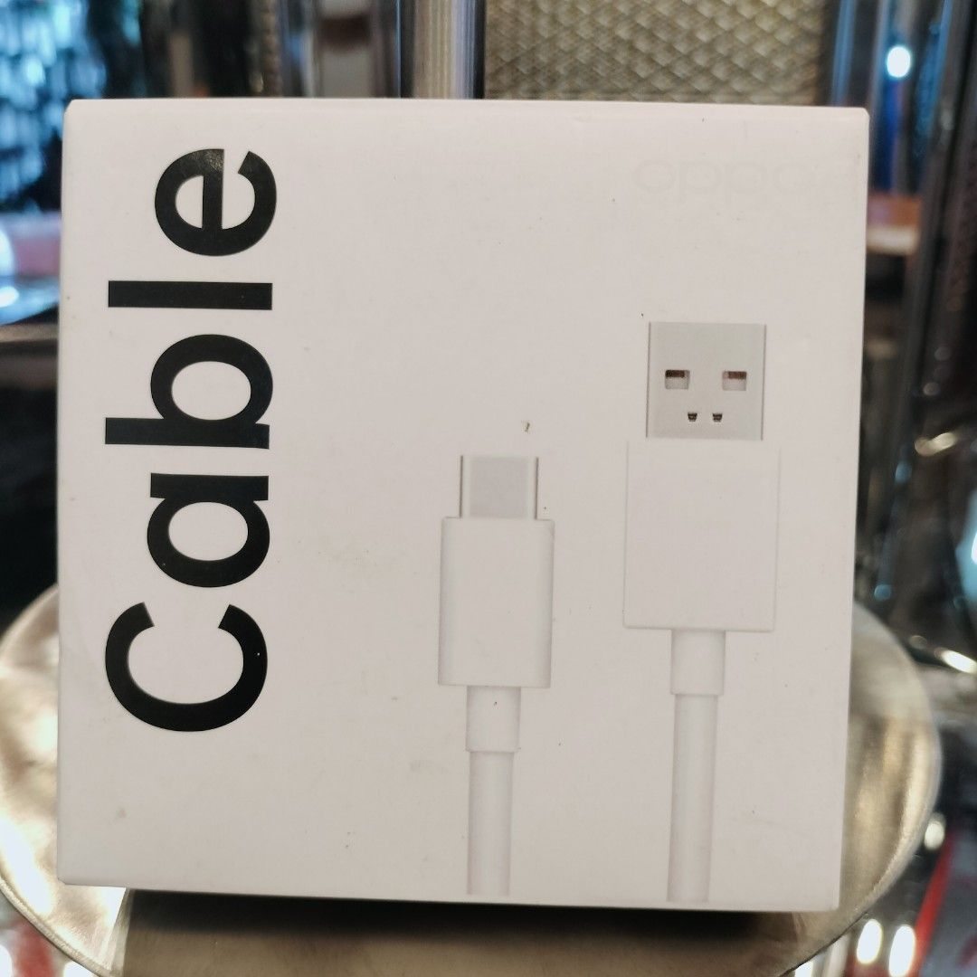 OPPO USB-C Charging Cable (Category: Chargers & Cables) located in Manila. Submitted by itsmekiahtaidgads (Listing ID 1420116362, Image 1). Description: - Genuine OPPO USB-C charging cable - White color - Brand new and unused - Comes in original packaging - Supports fast charging - Enables data transfer - Compatible with OPPO phones and other USB-C devices.