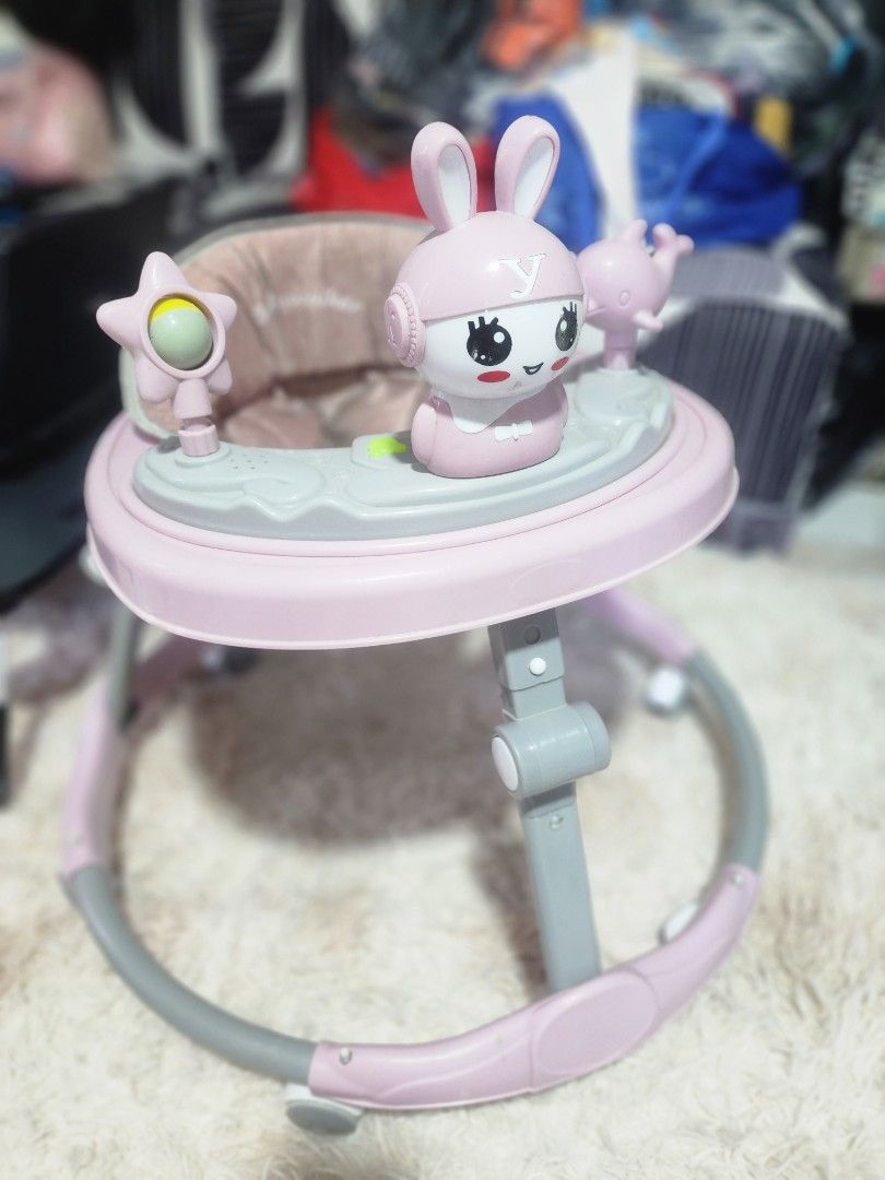 Pink Bunny Baby Walker (Category: Infant Playtime) located in Makati City. Submitted by create_s (Listing ID 1420129561, Image 1). Description: Excellent condition, rarely used. No issues Bought last November - Cute pink bunny design - Circular frame with seat - Includes toy attachment - Helps babies learn to walk - Pink and gray colors Loc: GMA Cavite Delivery c/o buyer.