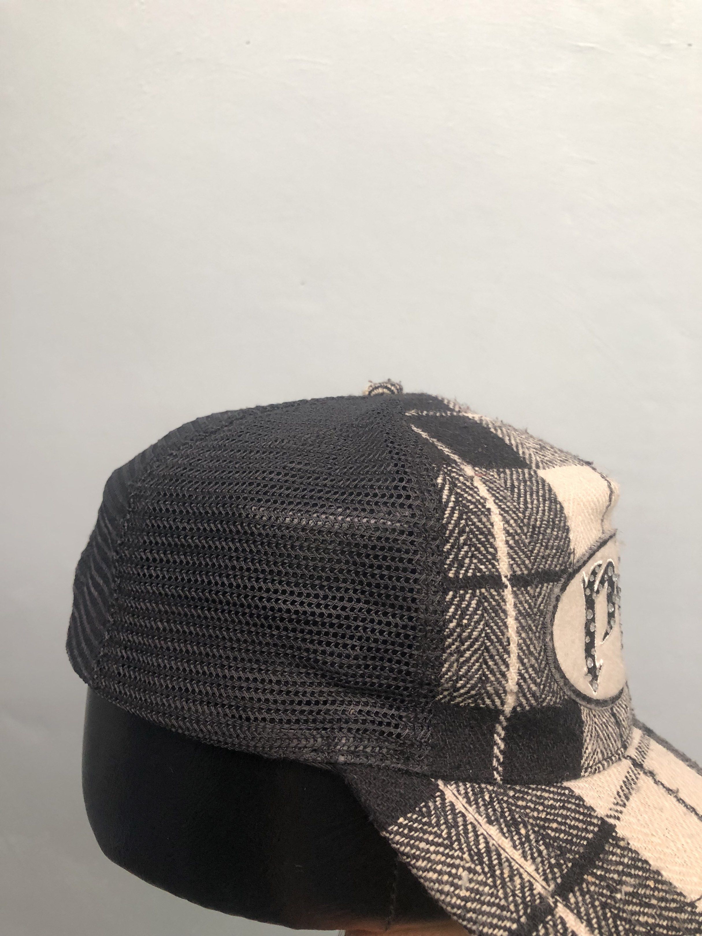 Playboy Rhinestone Cap (Category: Caps & Hats) located in Muntinlupa City. Submitted by afterclass_ph (Listing ID 1420023455, Image 2). Description: - Black mesh top - Black and white plaid brim - Button detail on top - Woven fabric - Brim with decorative text band needs wash and reshape.