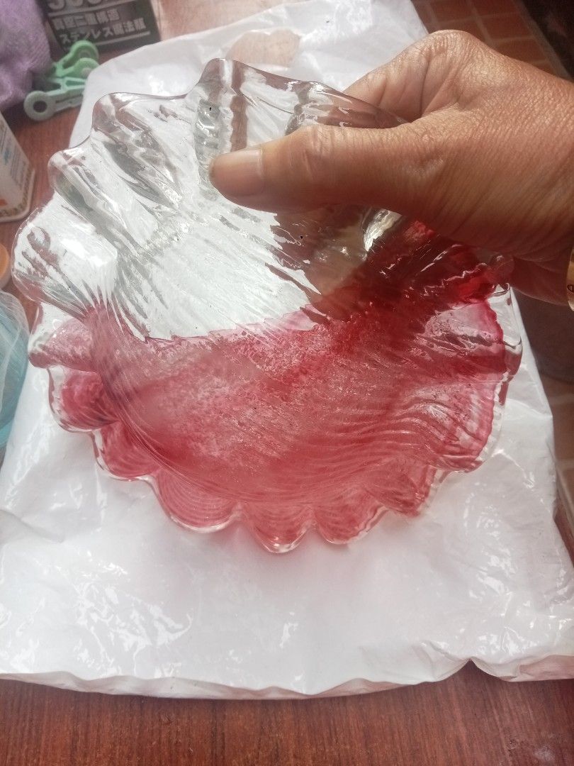 Red and Clear Glass Bowl (Category: Other Kitchenware & Tableware) located in Valenzuela. Submitted by beahocson (Listing ID 1420066159, Image 2). Description: - Elegant glass bowl - Unique ruffled edge design - Vibrant red interior - Clear, transparent exterior - Flower-like shape - Ideal for display or serving small items can use it as ashtray too brand new comes from japan.