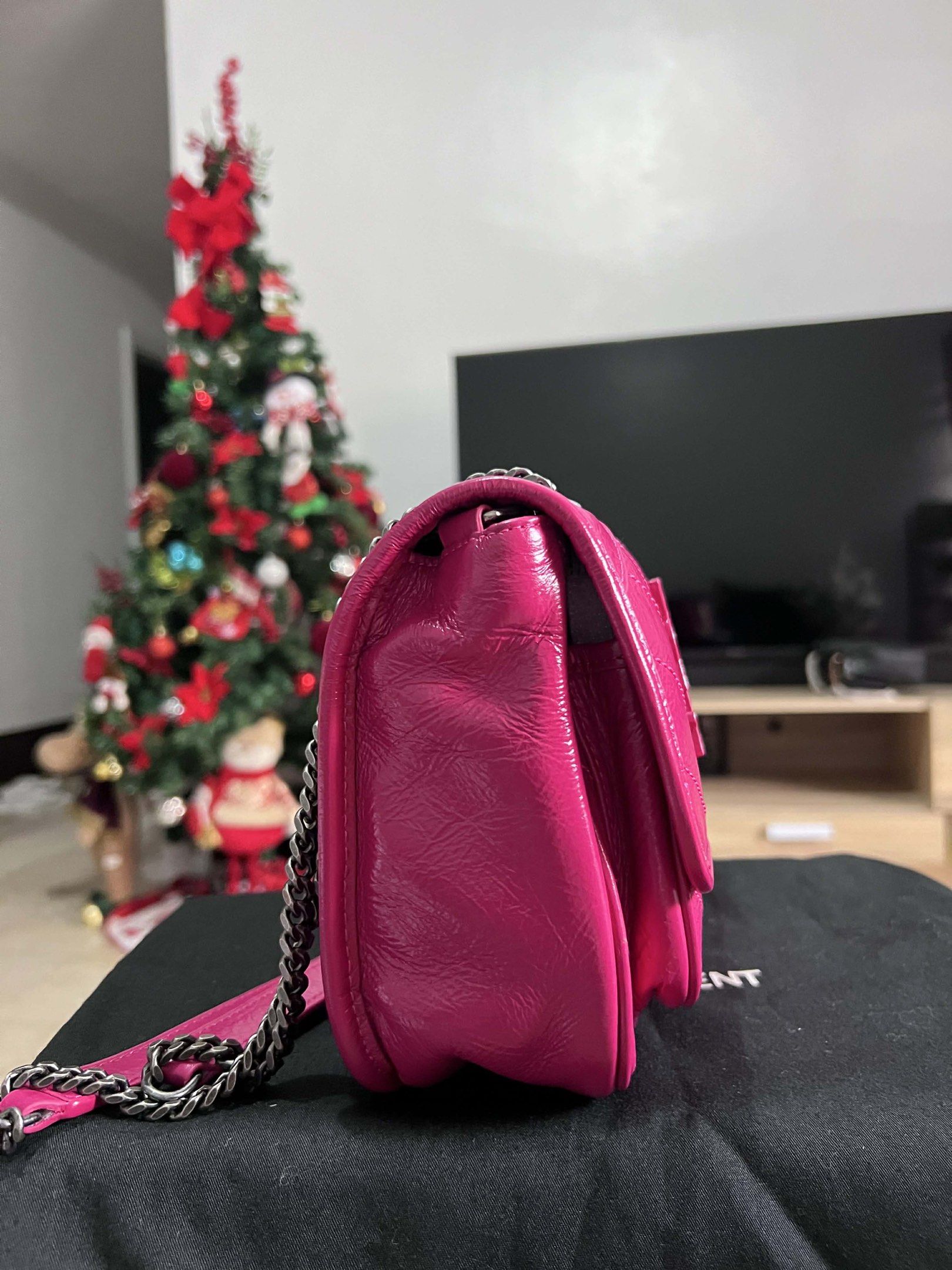 Saint Laurent Lou Mini Bag (Category: Luxury Bags & Wallets) located in Manila. Submitted by luxurytreasure.ph (Listing ID 1420046426, Image 2). Description: - Saint Laurent Lou Mini Bag - Vibrant pink color - Quilted design - Iconic YSL logo - Chain strap - Flap closure - Interior label: Saint Laurent Paris (Made in Italy) - Stylish and compact size.