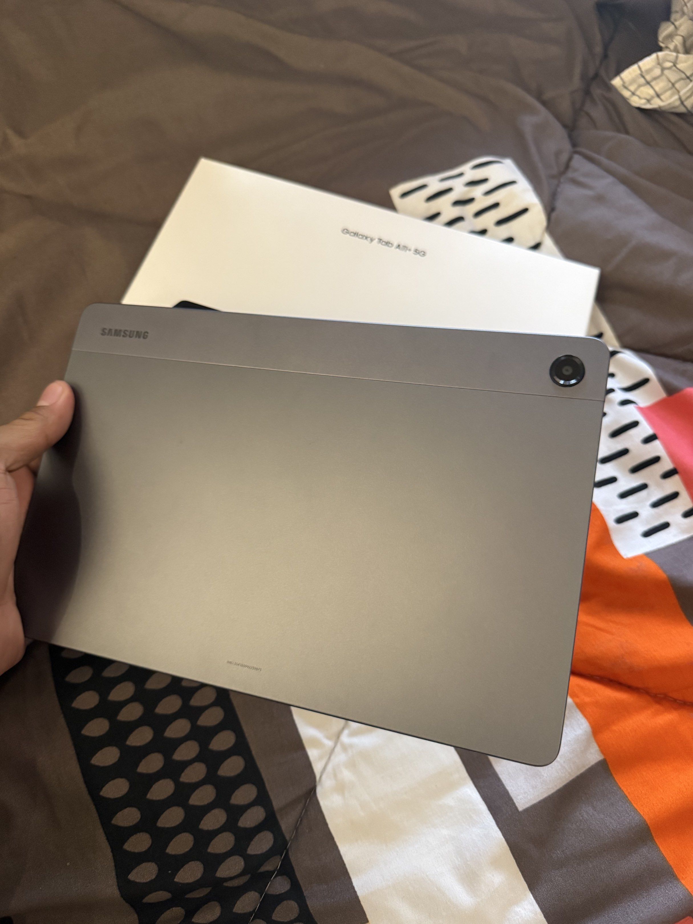 Samsung Galaxy Tab A11+ 5G (Category: Android) located in Muntinlupa City. Submitted by wreckzonee (Listing ID 1420046594, Image 2). Description: - Samsung Galaxy Tab A1+ 5G tablet - SRP ₱18000 - Color: Silver - Includes original box - Box color: White with tablet silhouette - Features front-facing and rear cameras - Screen color: Black.