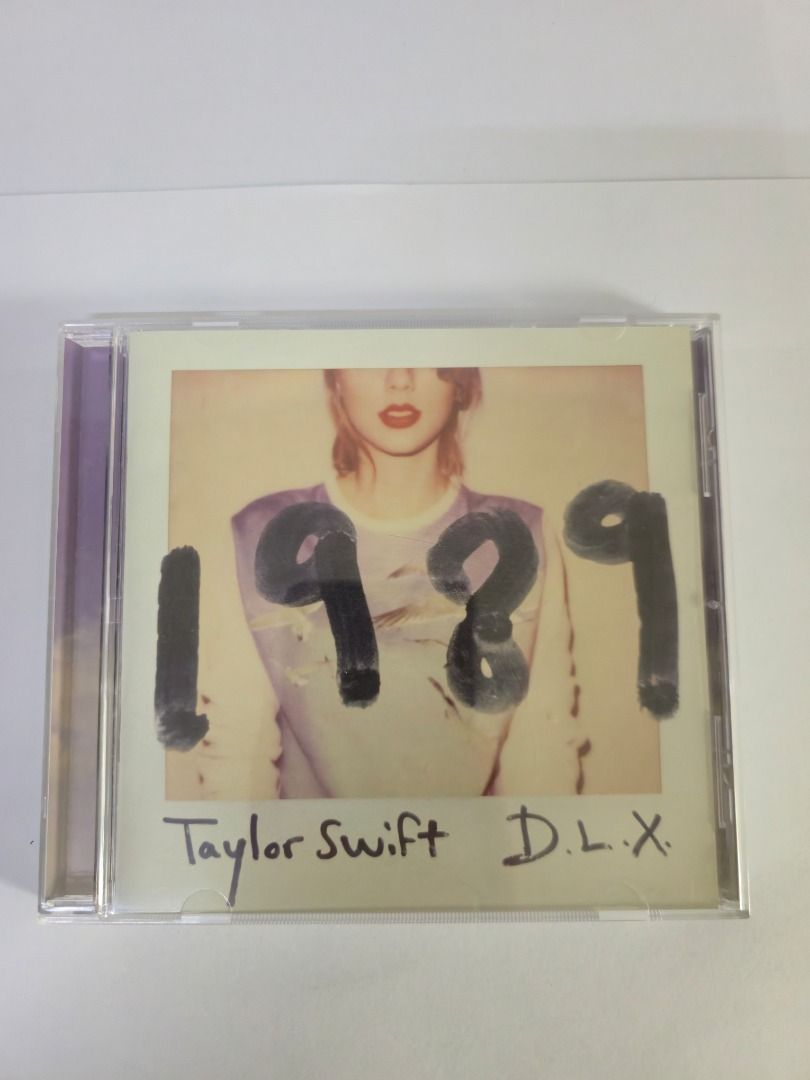 Taylor Swift 1989 (D.L.X. / Deluxe) (Category: CDs & DVDs) located in Manila. Submitted by nncollective (Listing ID 1420116924, Image 3). Description: - Original, Deluxe Edition, Slipcase packaging on a Jewel Case - Includes CD, Lyric booklet, 13 photos - Fixed Price - RFS: Decluttering - MOP: GCash or BDO - Available for same-day delivery or J&T. Feel free to ask if you have any questions! 💞.