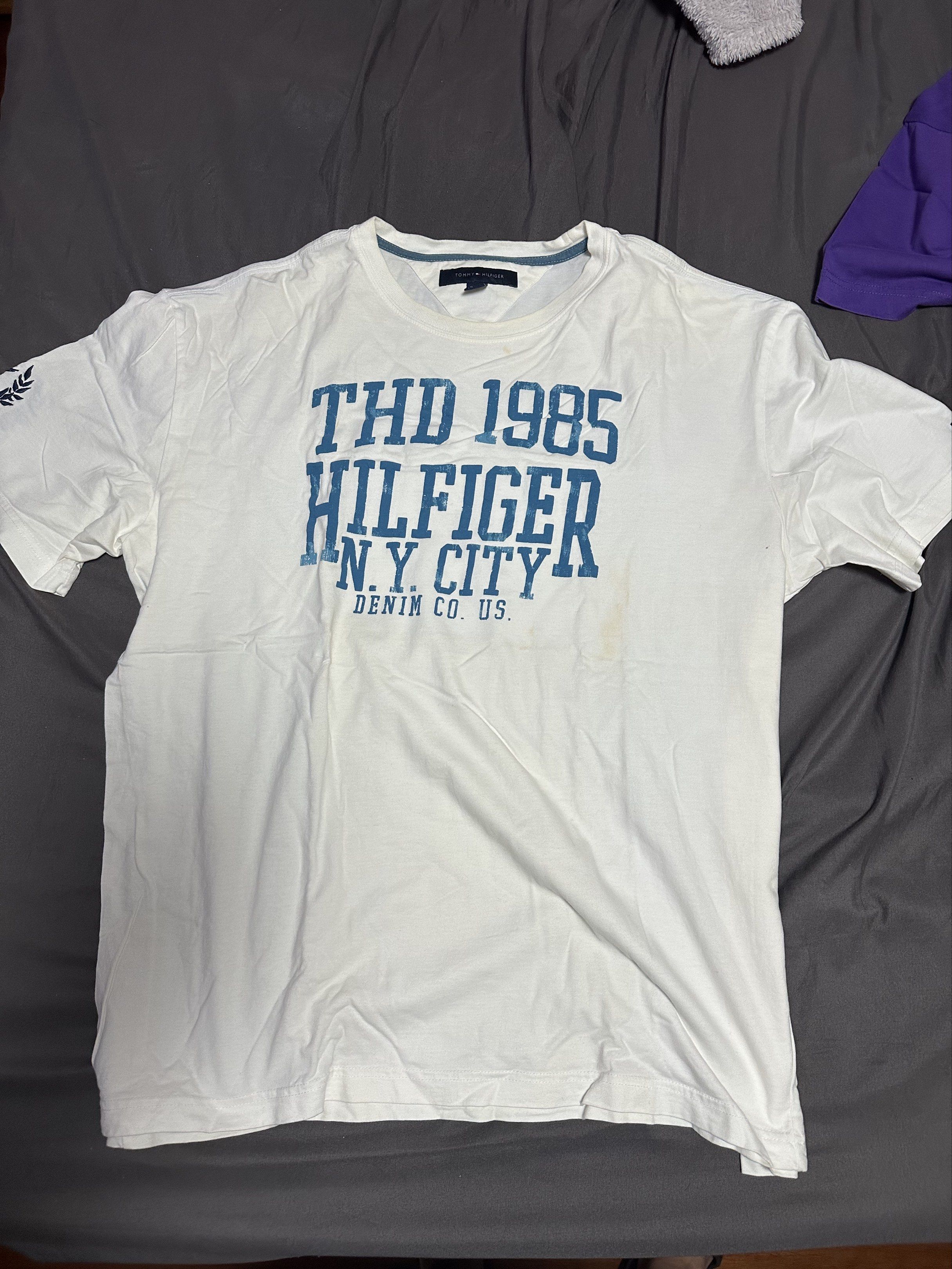 Tommy Hilfiger Shirt (Category: Tshirts & Polo Shirts ) located in Paranaque City. Submitted by lancedleon (Listing ID 1419999468, Image 1). Description: Tommy Hilfiger Shirt, XL on tag, fits L slight yellowing on shirt but can be removed when washed..