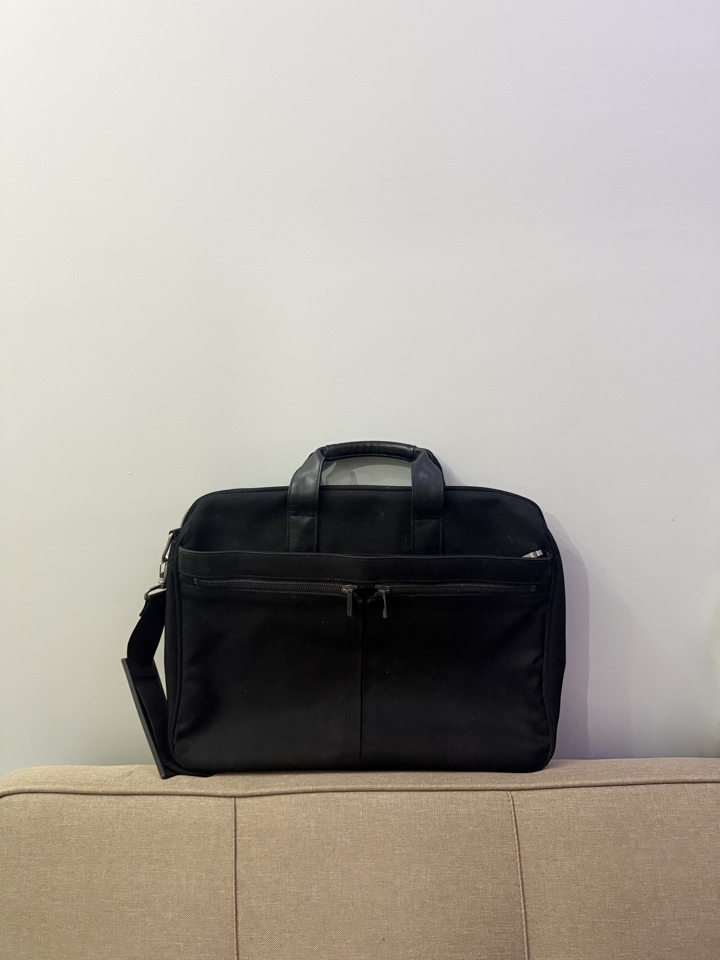 Topvalu Black Briefcase (Category: Briefcases) located in Pasay City. Submitted by karlamarithe (Listing ID 1420125695, Image 1). Description: - Topvalu black briefcase - Multiple compartments for organization - Includes top handle and detachable shoulder strap - Zipper closure - Durable material - Ideal for documents and essentials.