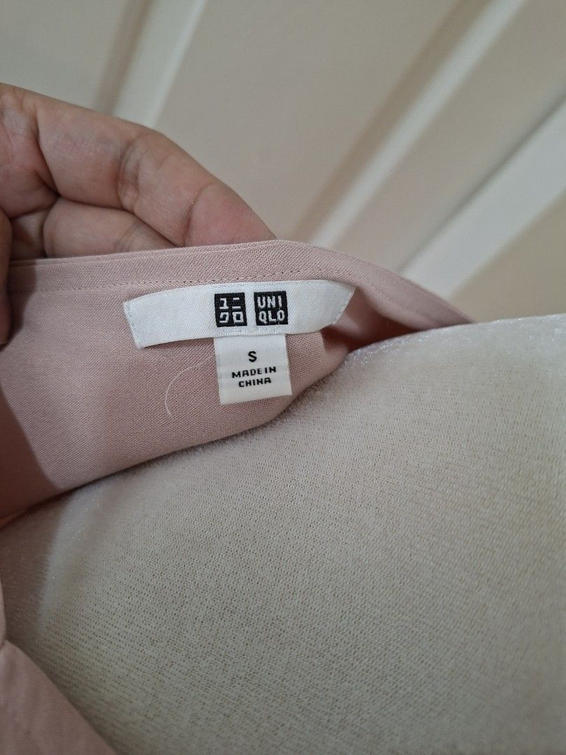 Uniqlo Light Pink Blouse - Size S (Category: Blouses) located in Pasig City. Submitted by avcan (Listing ID 1420017054, Image 3). Description: - Uniqlo light pink blouse - Size: S - Features long sleeves - Classic design - Versatile style - Made in China - For reference, mannequin dimensions are: Bust: 35" Waist: 27" Hips: 36".