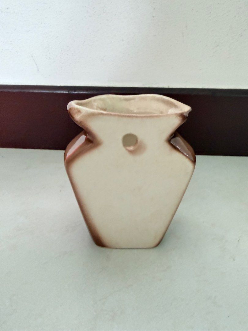 Vase (Category: Vases & Decorative Bowls) located in Singapore. Submitted by happywhale.62ad34 (Listing ID 1420007873, Image 3). Description: Ceramic vase (leave print) holes for hanging L: 10cm, D: 8.5cm, Inner D: 5.3cm H: 11cm Do take note of the small crack outside of the bottom vase (Attached Picture) No cracks inside the vase Not for fussy Brand new No warranty Self collection Margaret Drive.