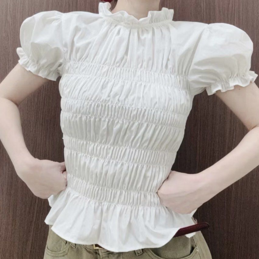 White Smocked Blouse with Ruffle Details (Category: Blouses) located in Guagua. Submitted by prefted (Listing ID 1420133762, Image 2). Description: - can wear it in two ways - once worn - all the way from vietnam.